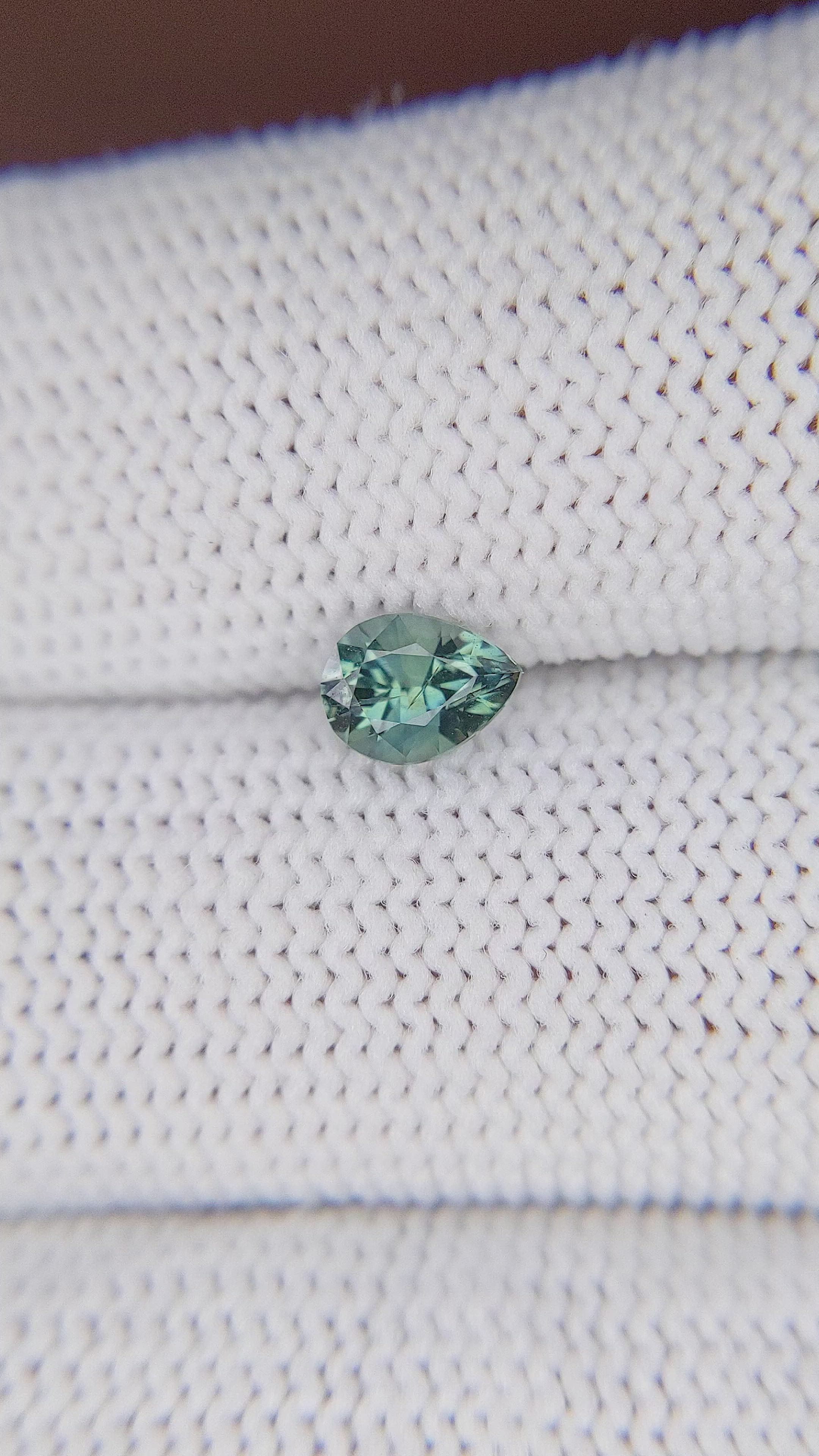 0.69 Ct. Bluish Green Sapphire from Madagascar Size Video