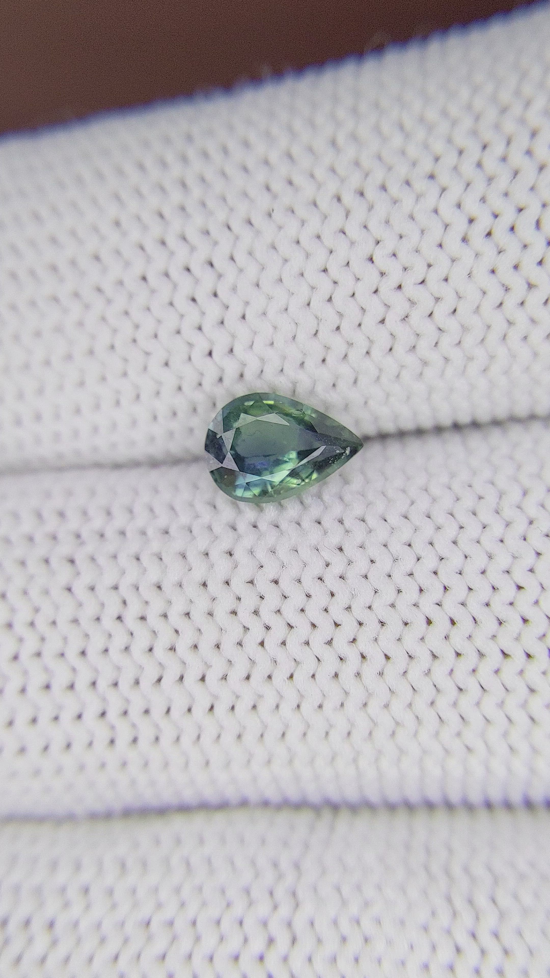 0.74 Ct. Bluish Green Sapphire from Madagascar Size Video