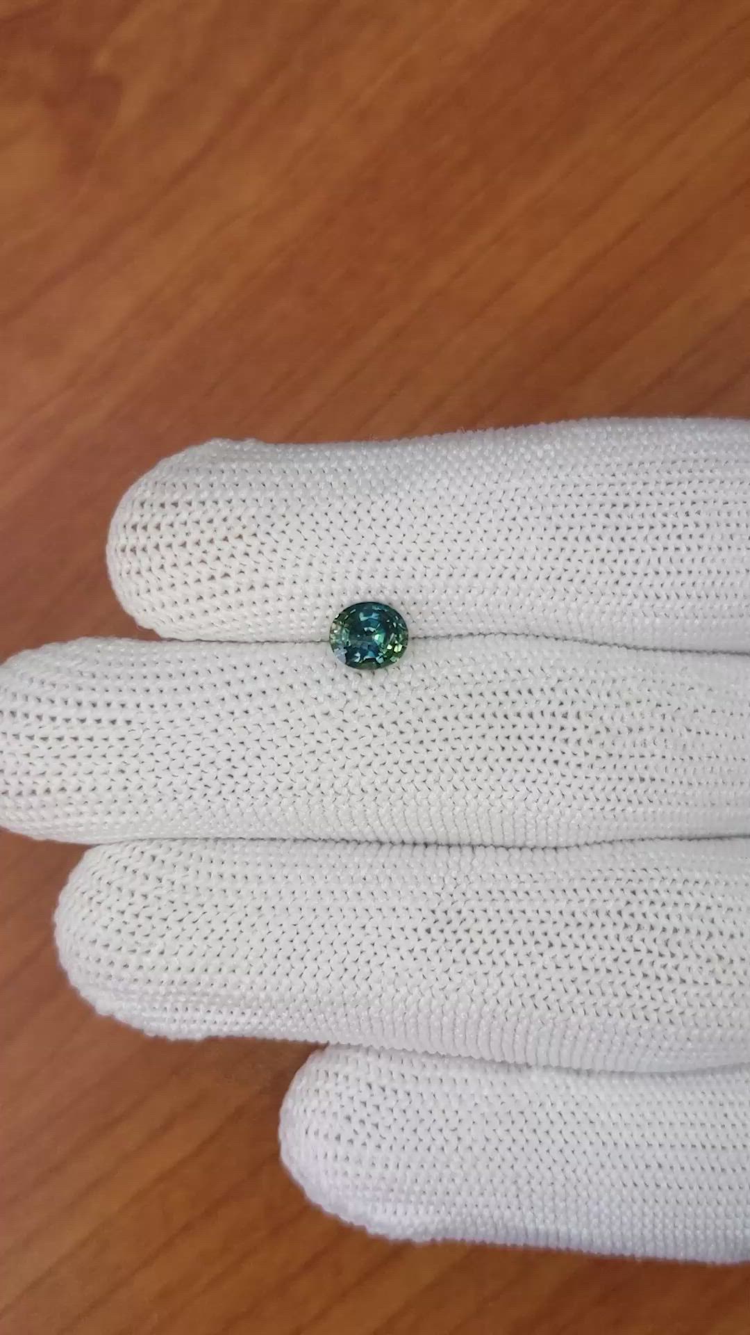 0.90 Ct. Bluish Green Sapphire from Madagascar Size Video