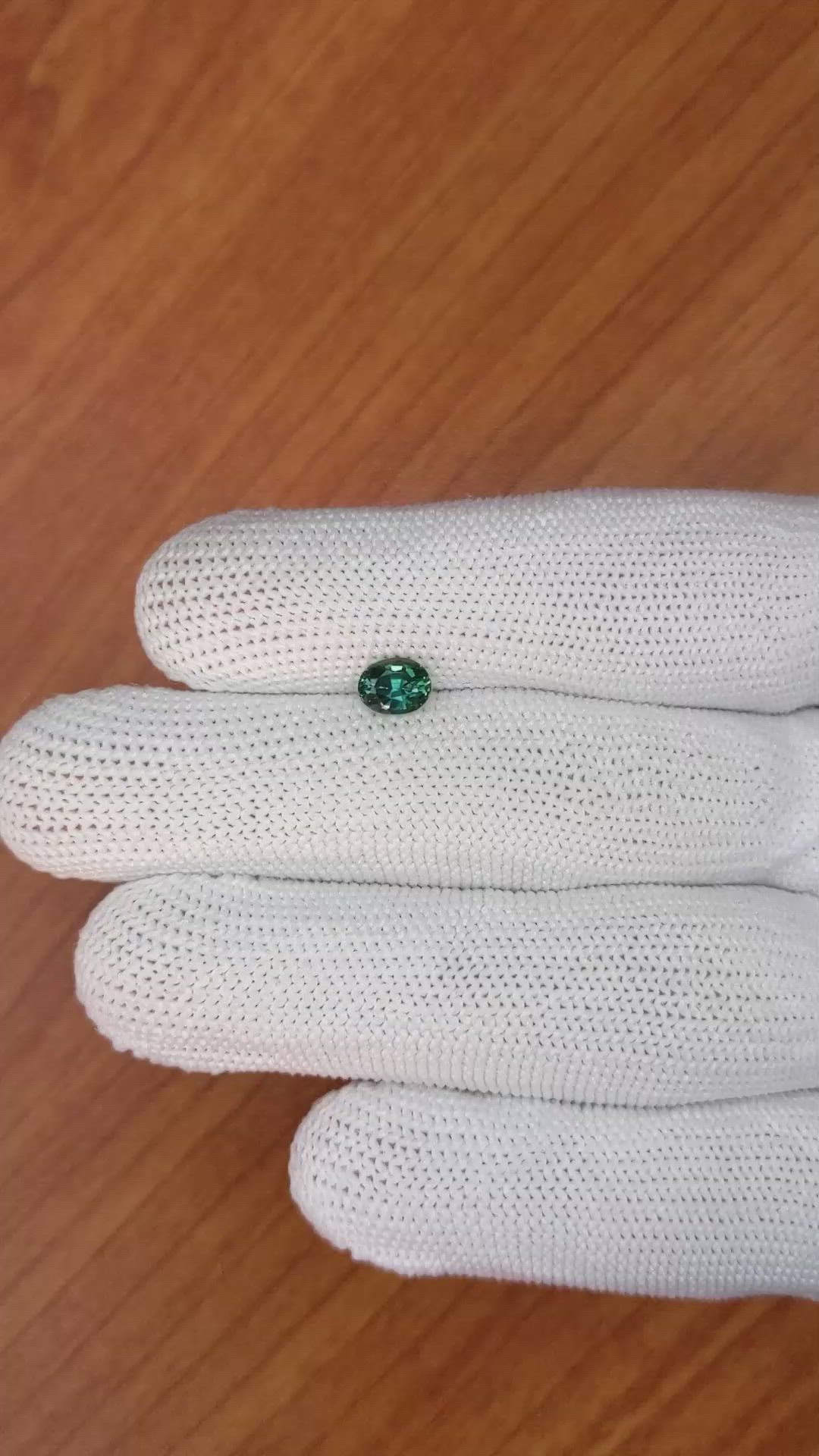 0.83 Ct. Bluish Green Sapphire from Madagascar Size Video