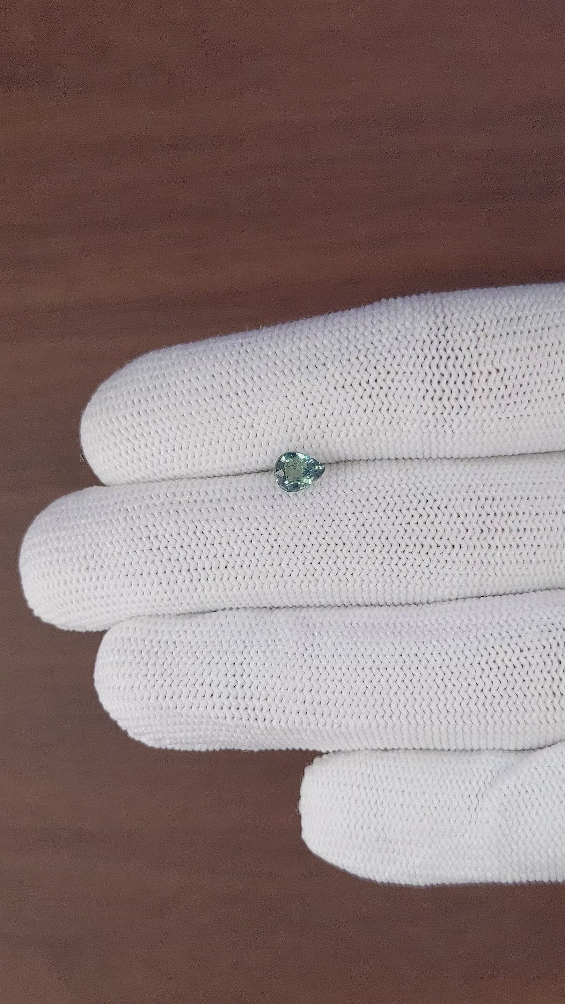 0.71 Ct. Bluish Green Sapphire from Madagascar Size Video