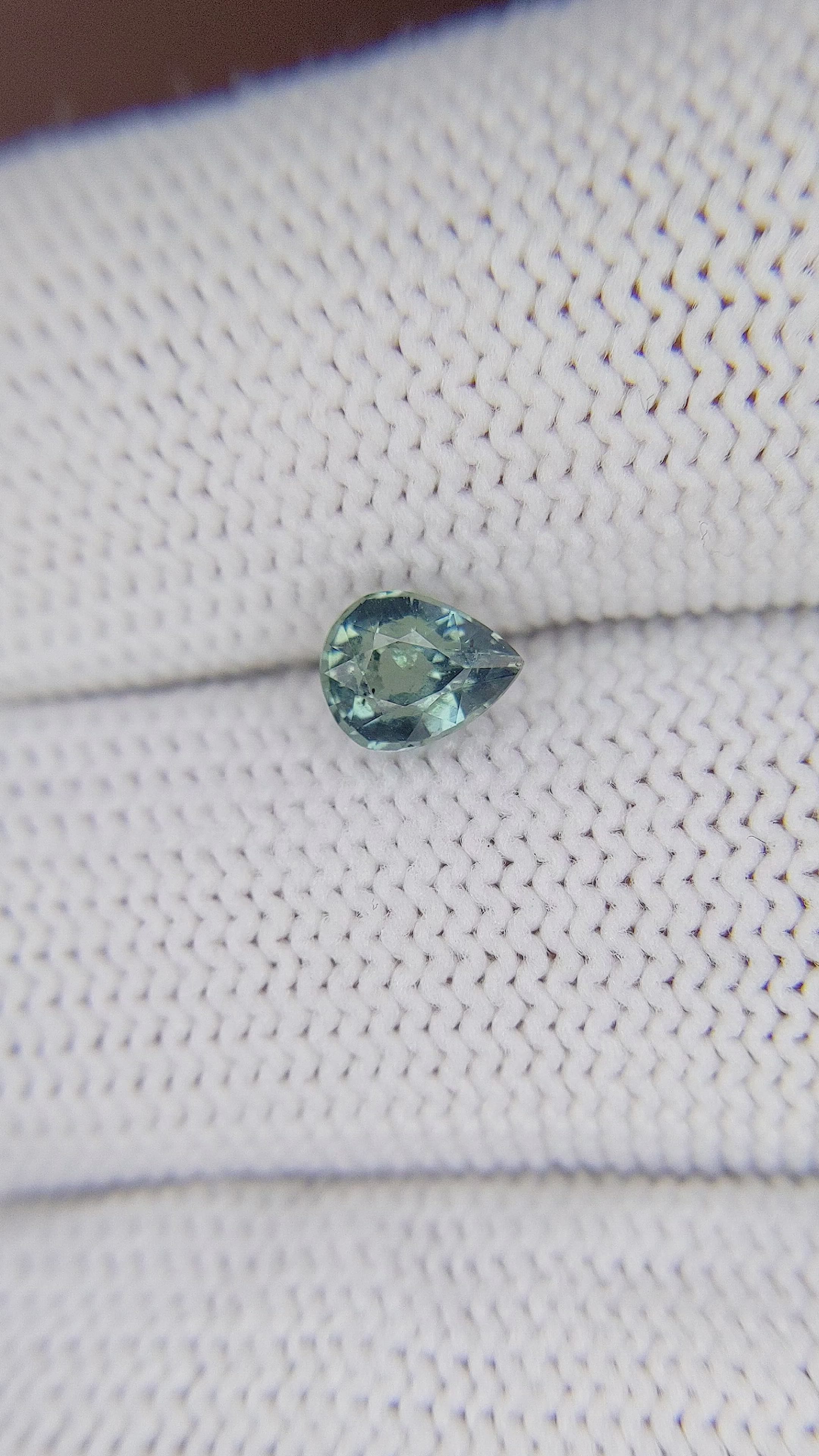 0.71 Ct. Bluish Green Sapphire from Madagascar Size Video