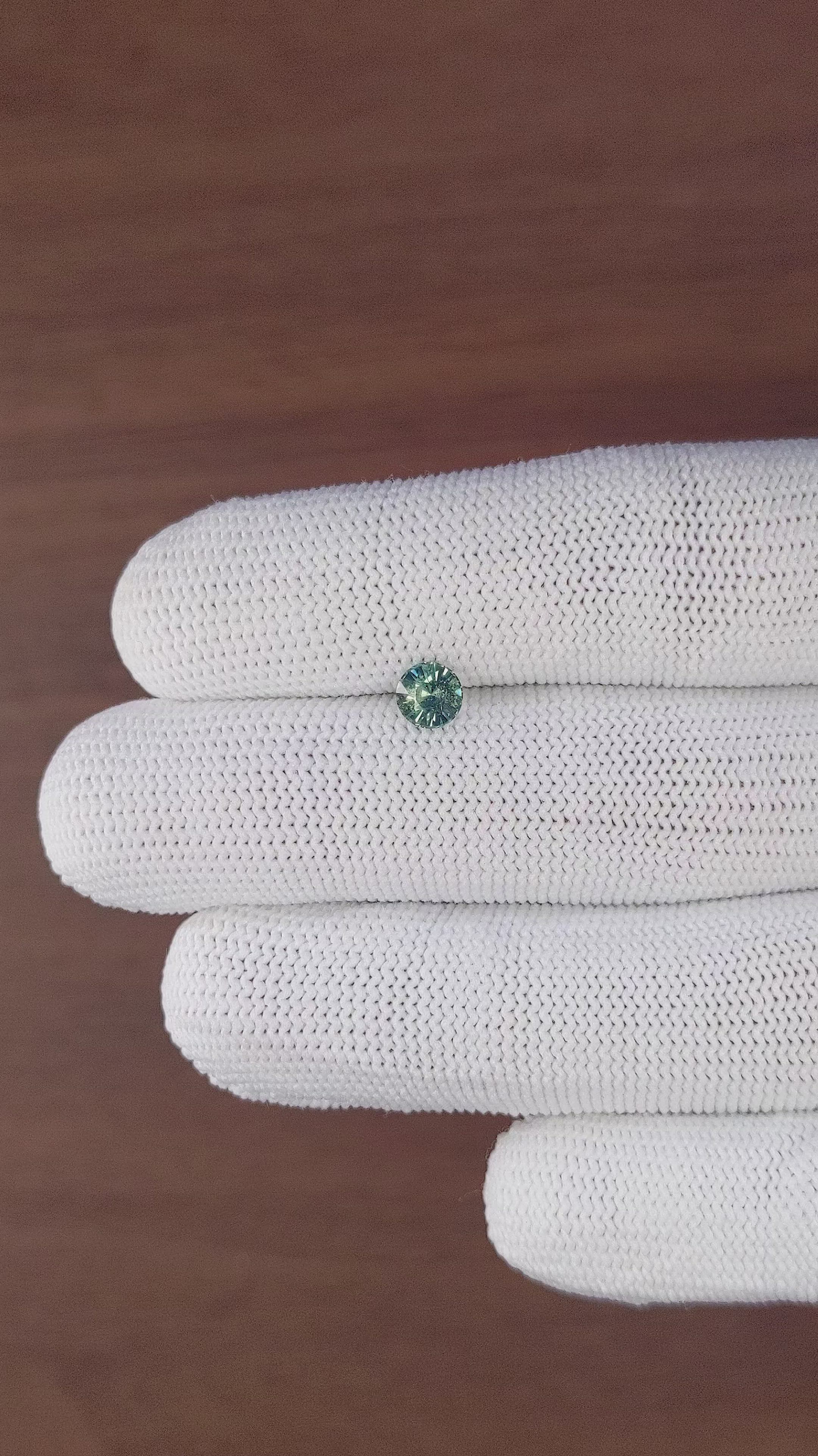 0.72 Ct. Bluish Green Sapphire from Madagascar Size Video