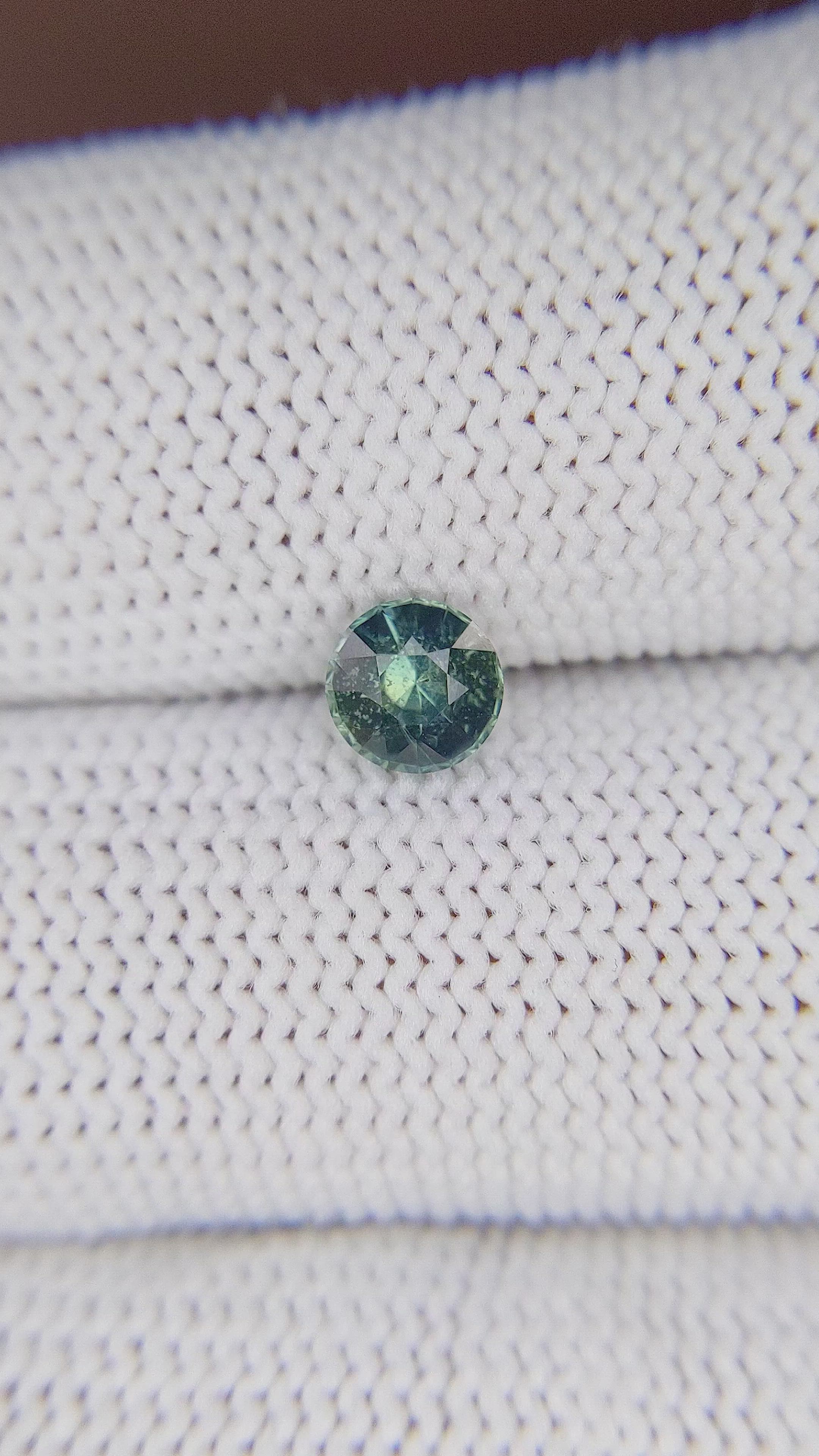 0.72 Ct. Bluish Green Sapphire from Madagascar Size Video