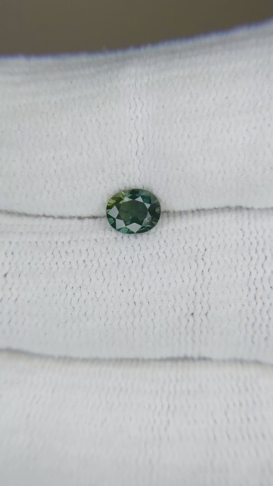 0.69 Ct. Bluish Green Sapphire from Thailand Size Video