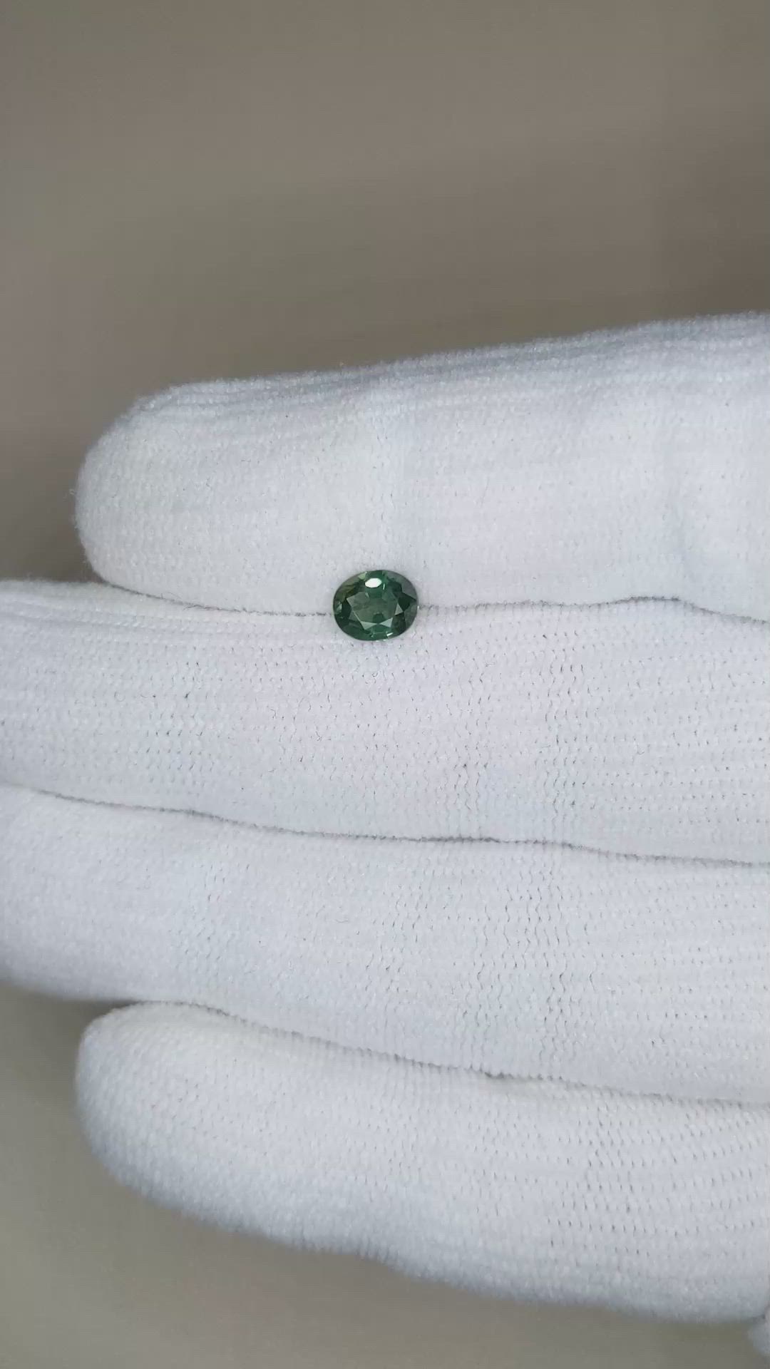 0.69 Ct. Bluish Green Sapphire from Thailand Size Video