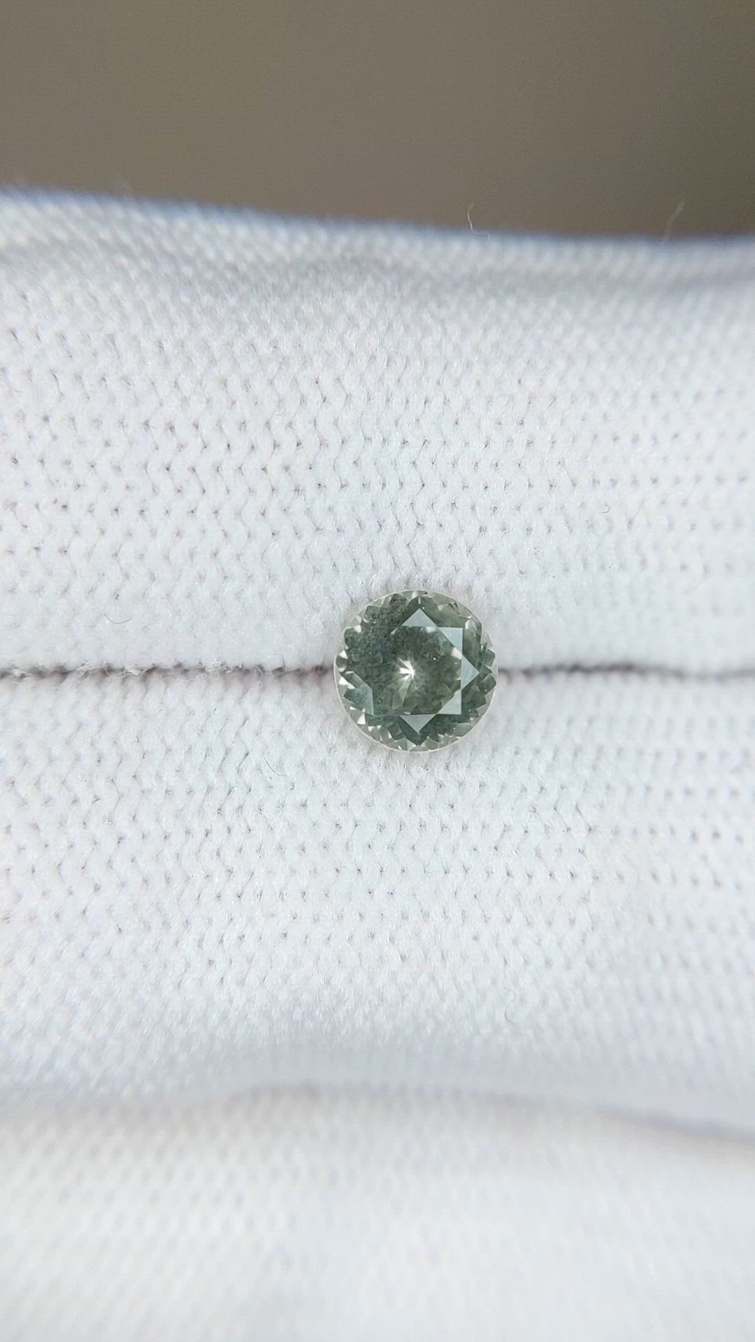 0.98 Ct. Yellowish Green Sapphire from Montana Size Video