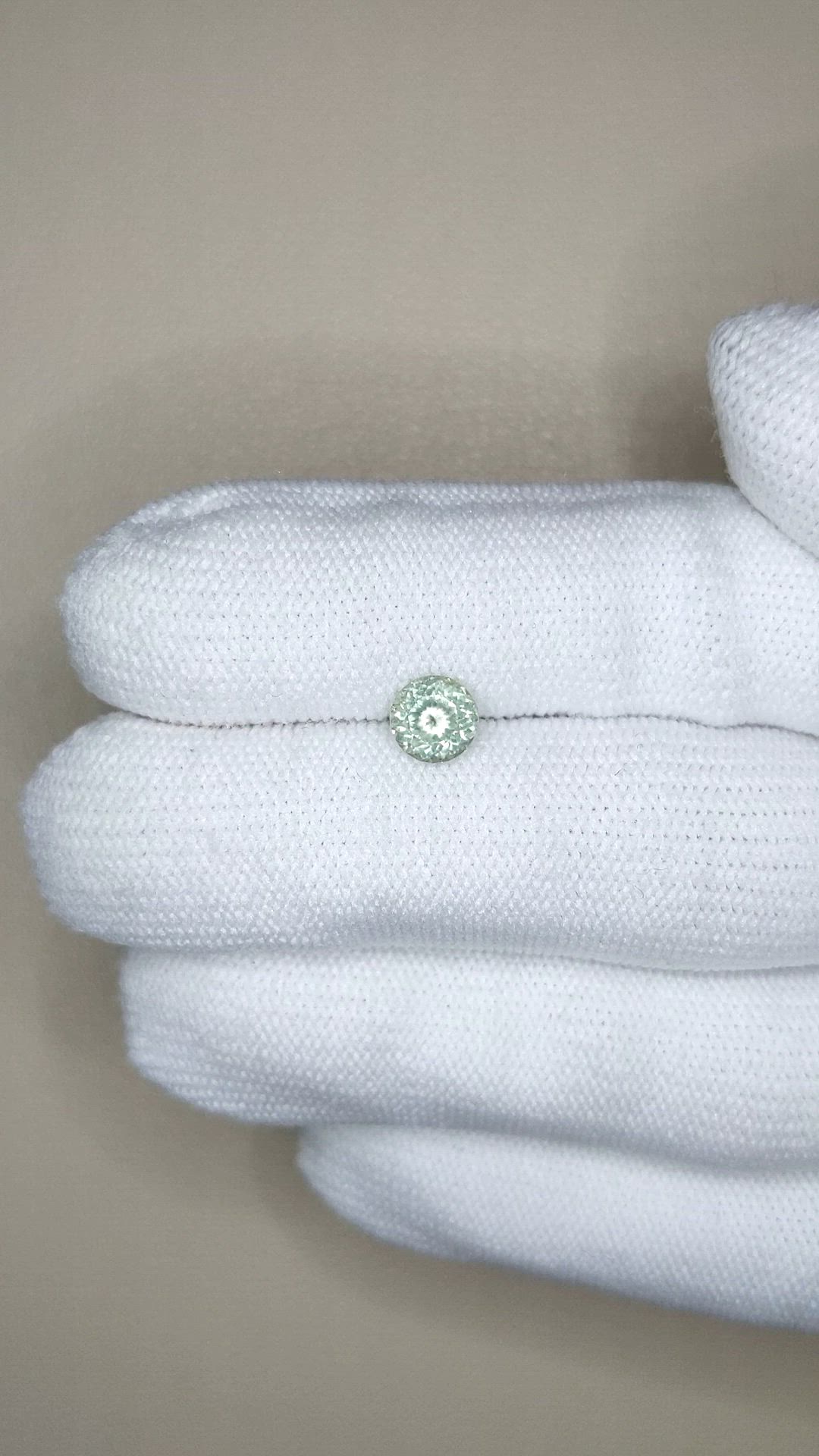 0.98 Ct. Yellowish Green Sapphire from Montana Size Video