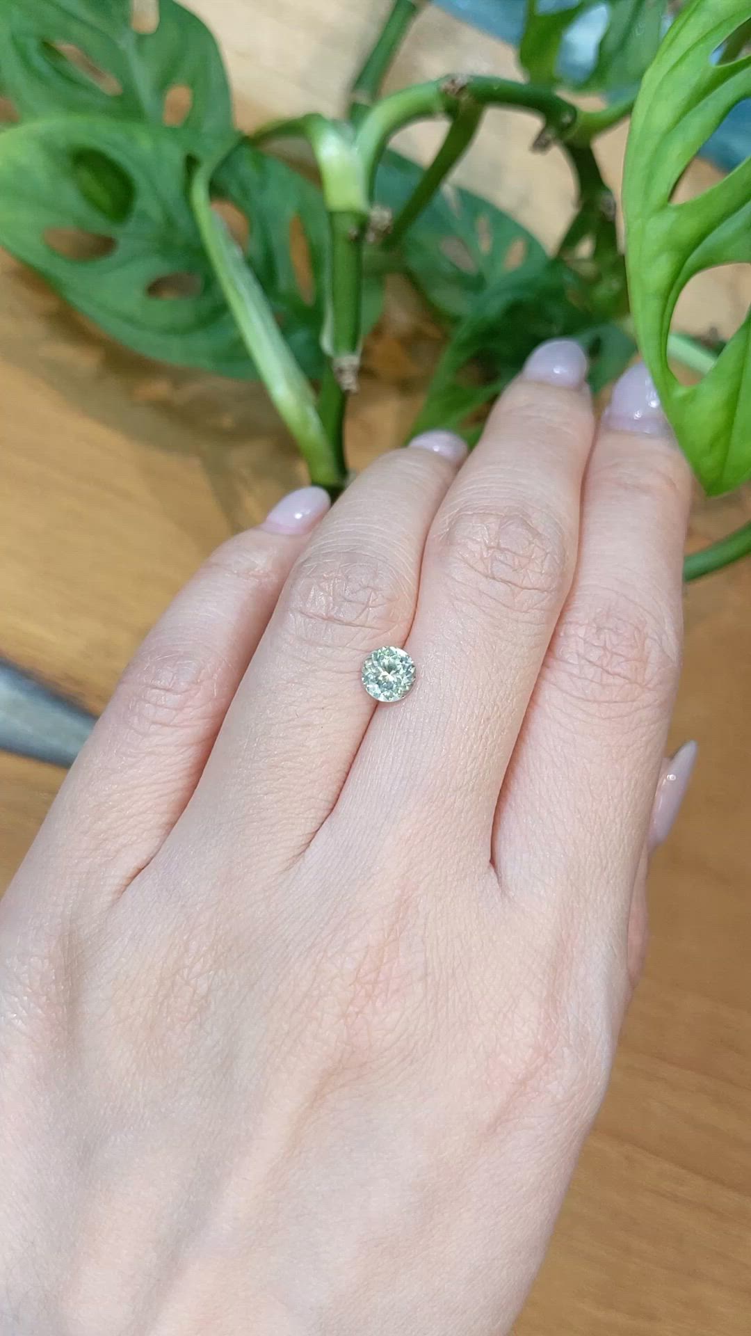 0.98 Ct. Yellowish Green Sapphire from Montana Size Video