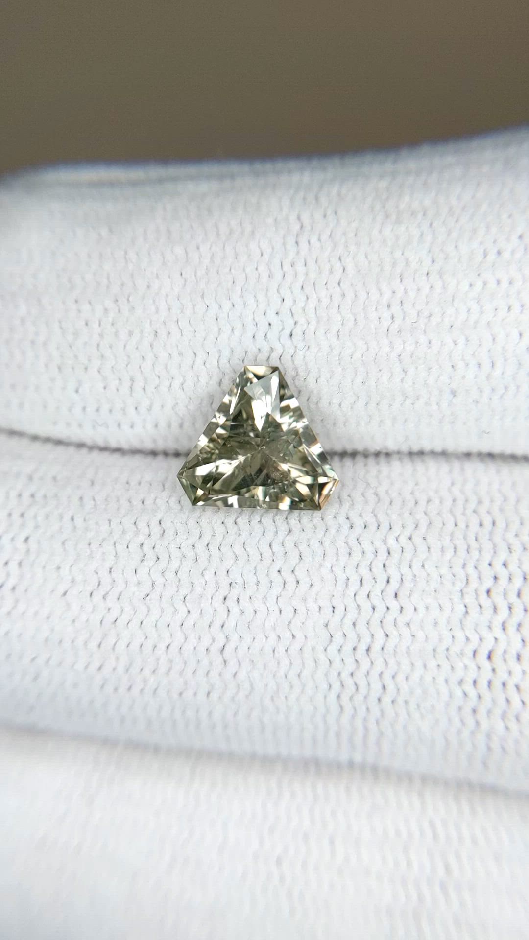 2.41 Ct. Yellowish Green Sapphire from Montana Size Video
