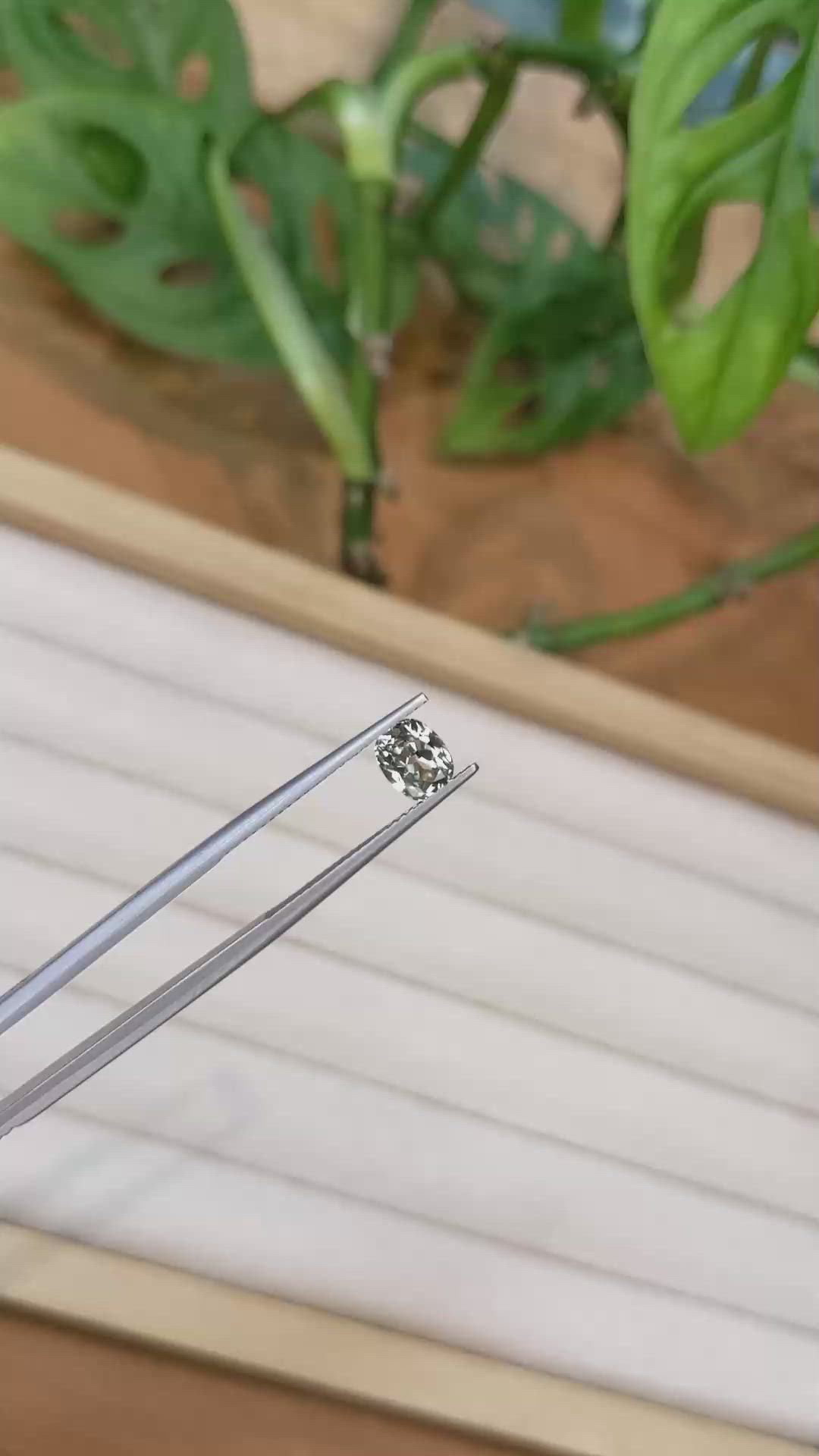 0.91 Ct. Yellowish Green Sapphire from Montana Size Video