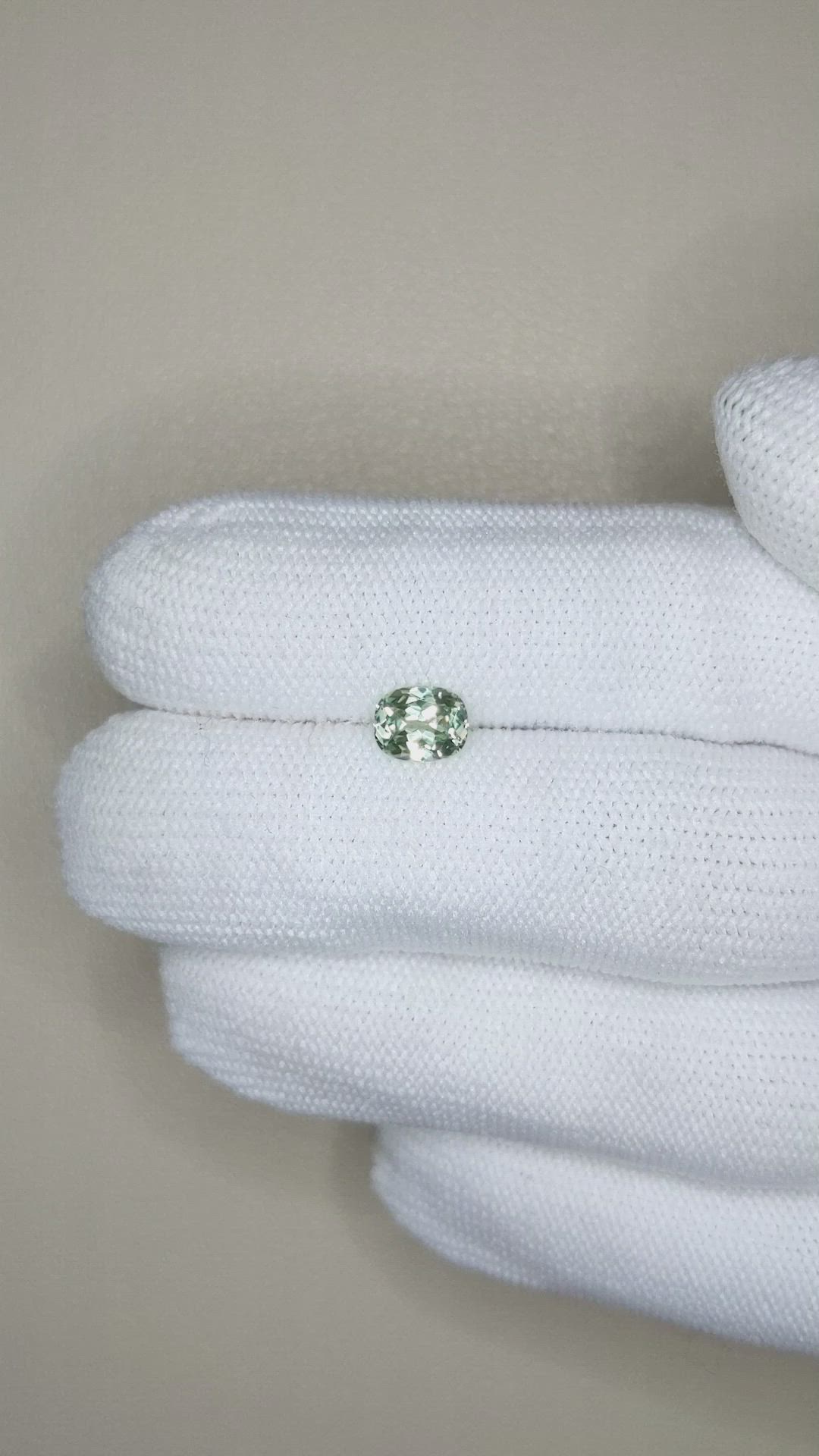 0.91 Ct. Yellowish Green Sapphire from Montana Size Video