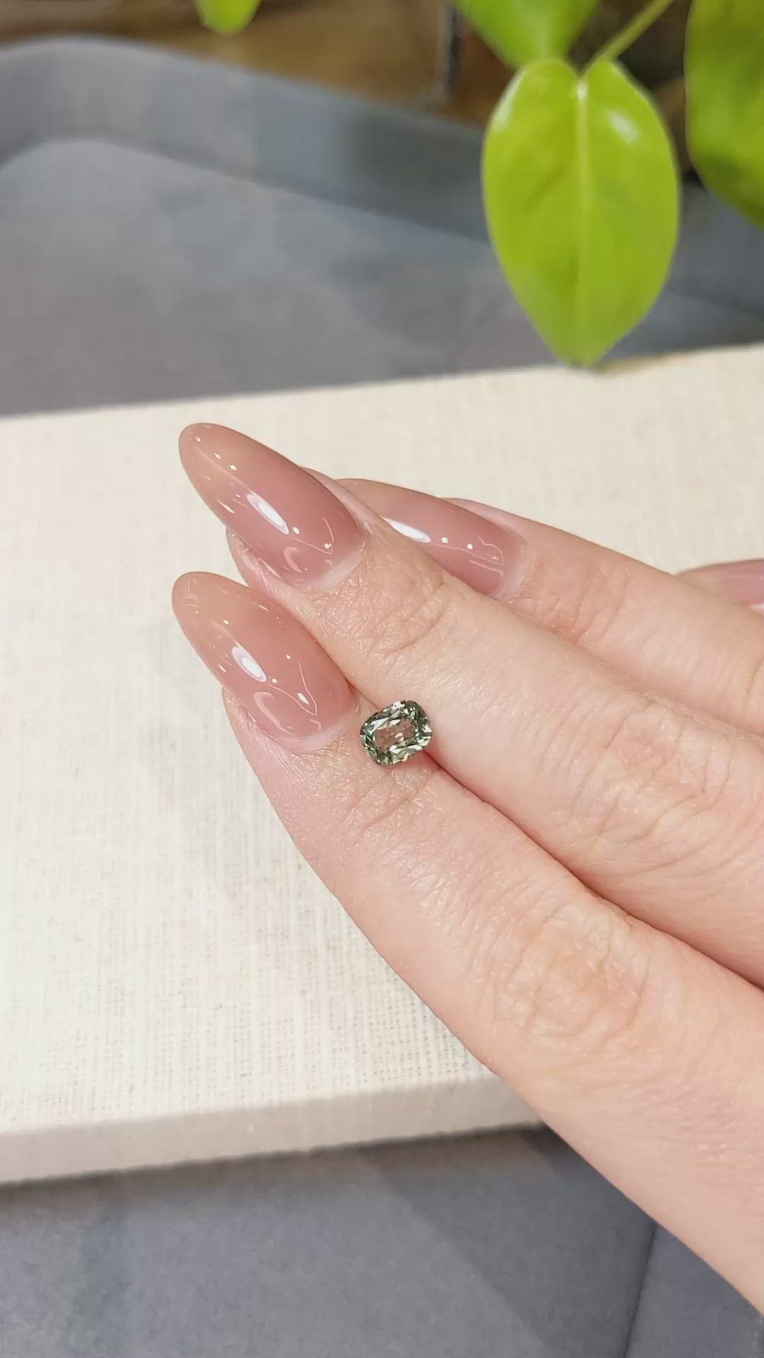 0.91 Ct. Yellowish Green Sapphire from Montana Size Video