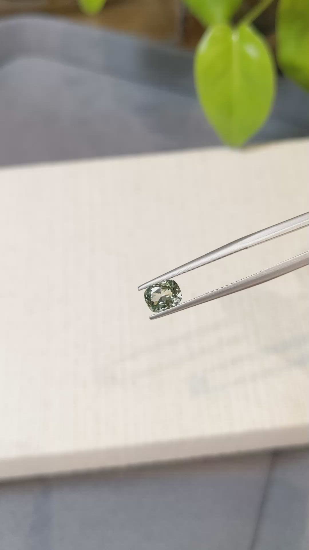 0.91 Ct. Yellowish Green Sapphire from Montana Size Video