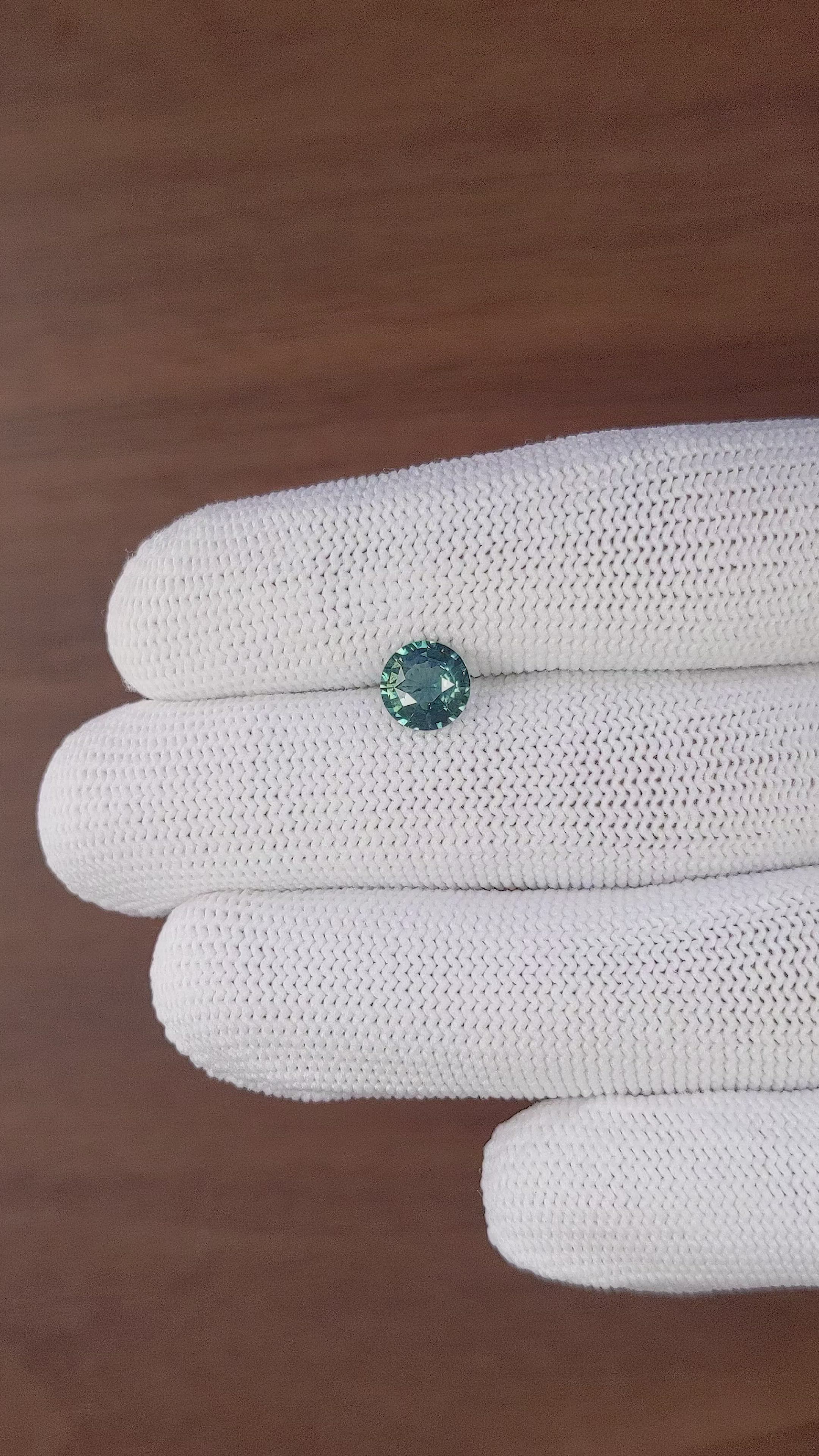 1.58 Ct. Greenish Blue Sapphire from Montana Size Video