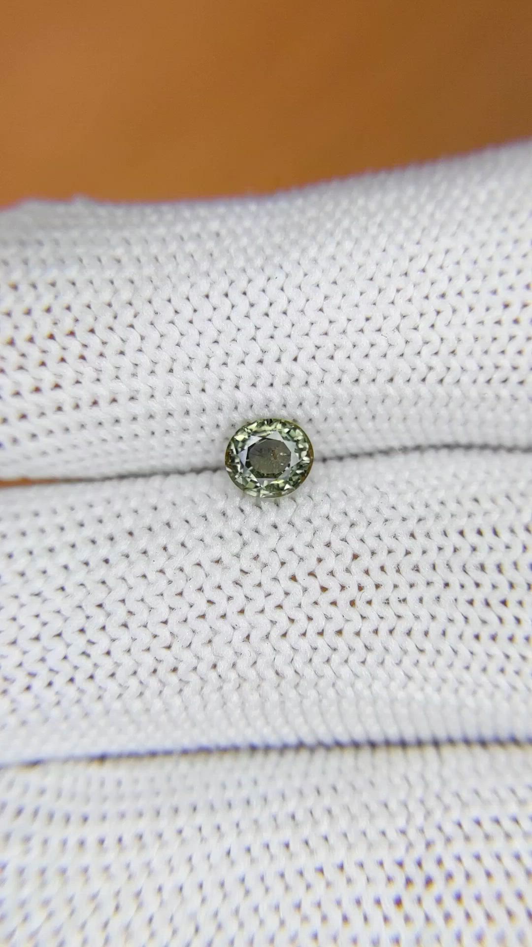 0.59 Ct. Brownish Green Sapphire from Ceylon (Sri Lanka) Size Video