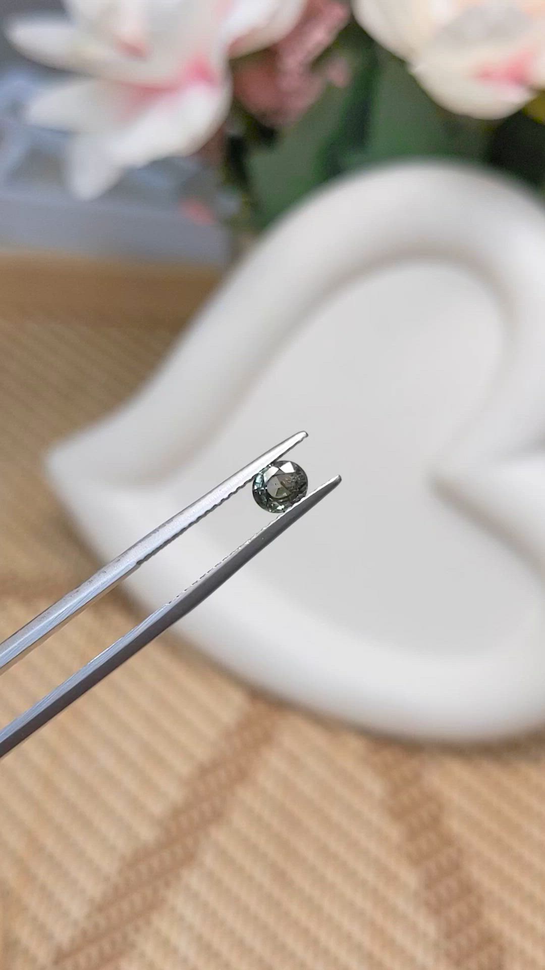 0.59 Ct. Brownish Green Sapphire from Ceylon (Sri Lanka) Size Video