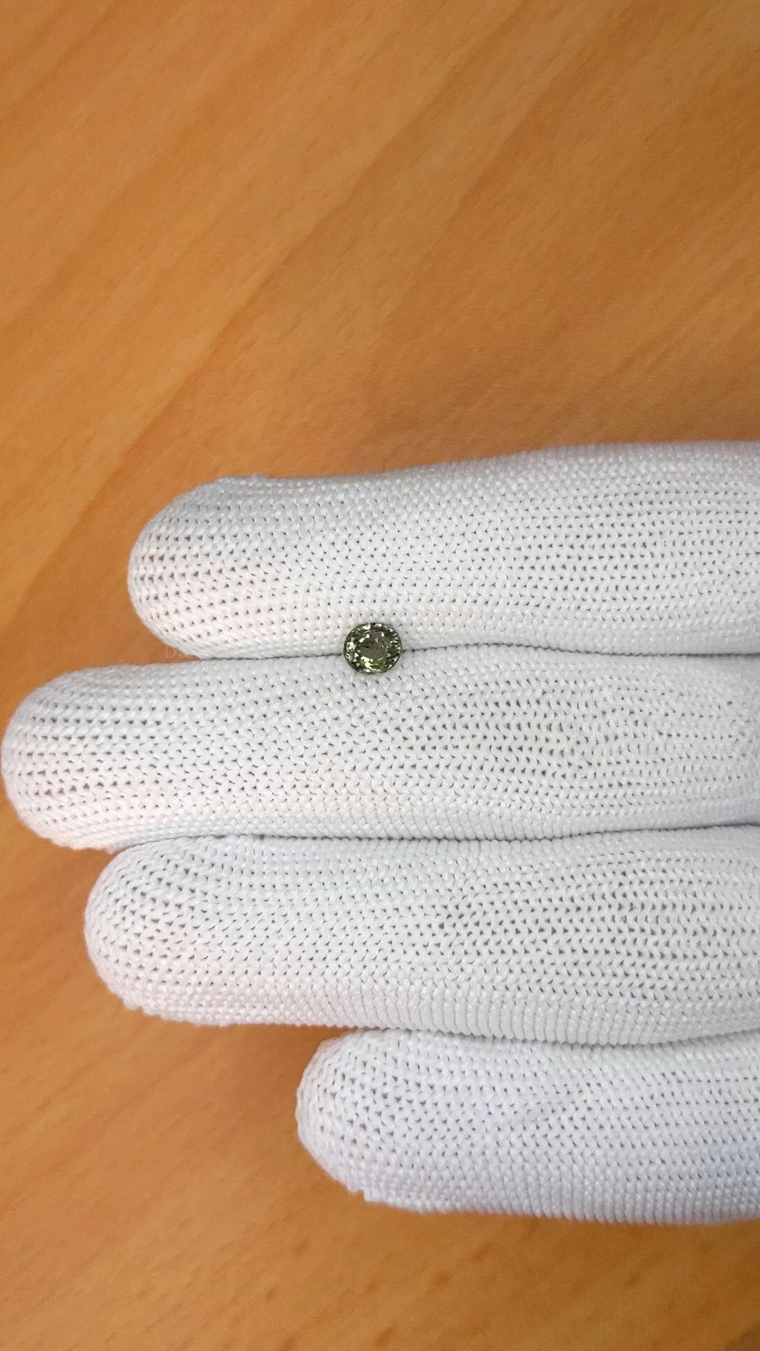 0.59 Ct. Brownish Green Sapphire from Ceylon (Sri Lanka) Size Video