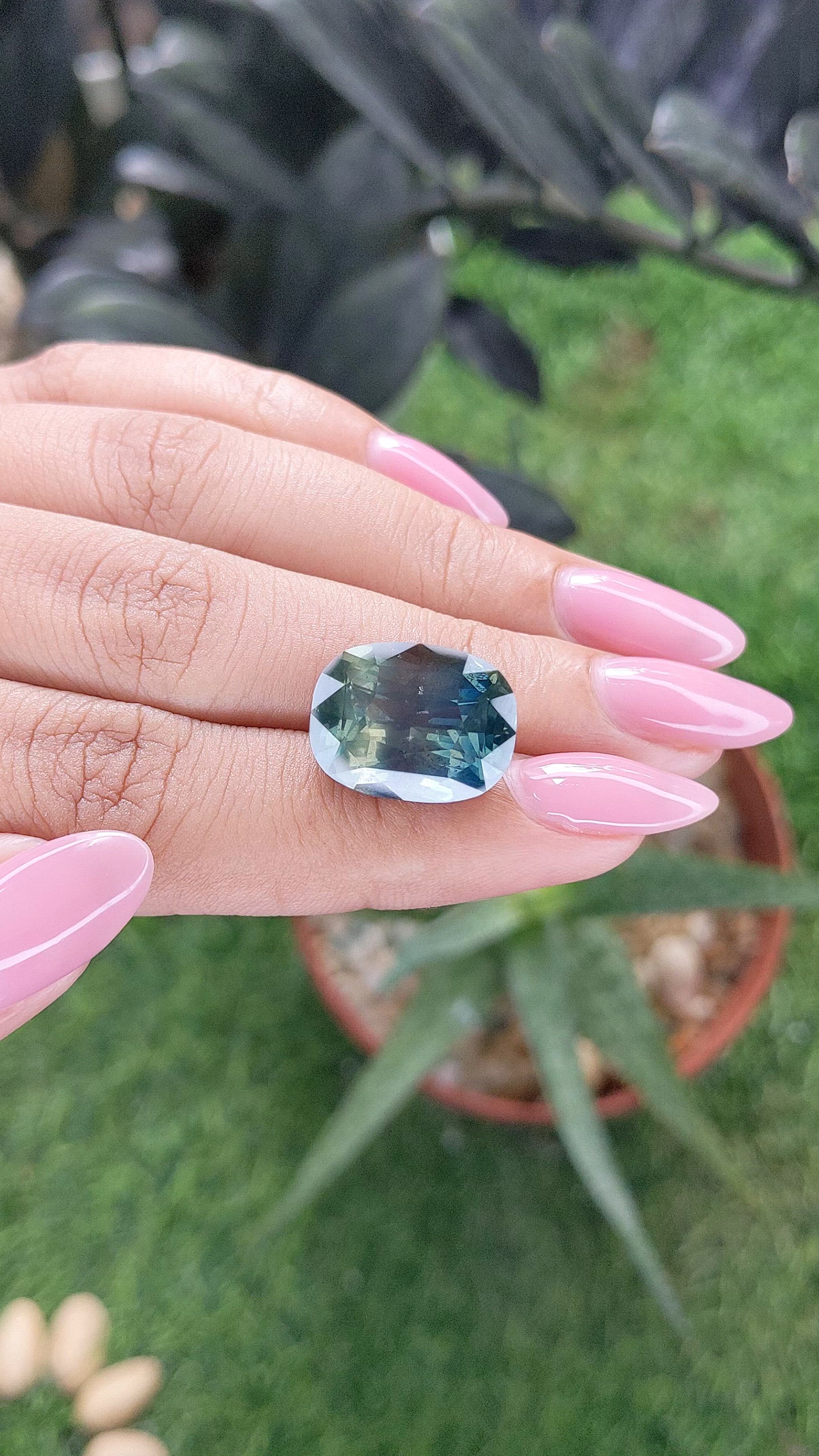 16.30 Ct. Bluish Green Sapphire from Madagascar Size Video