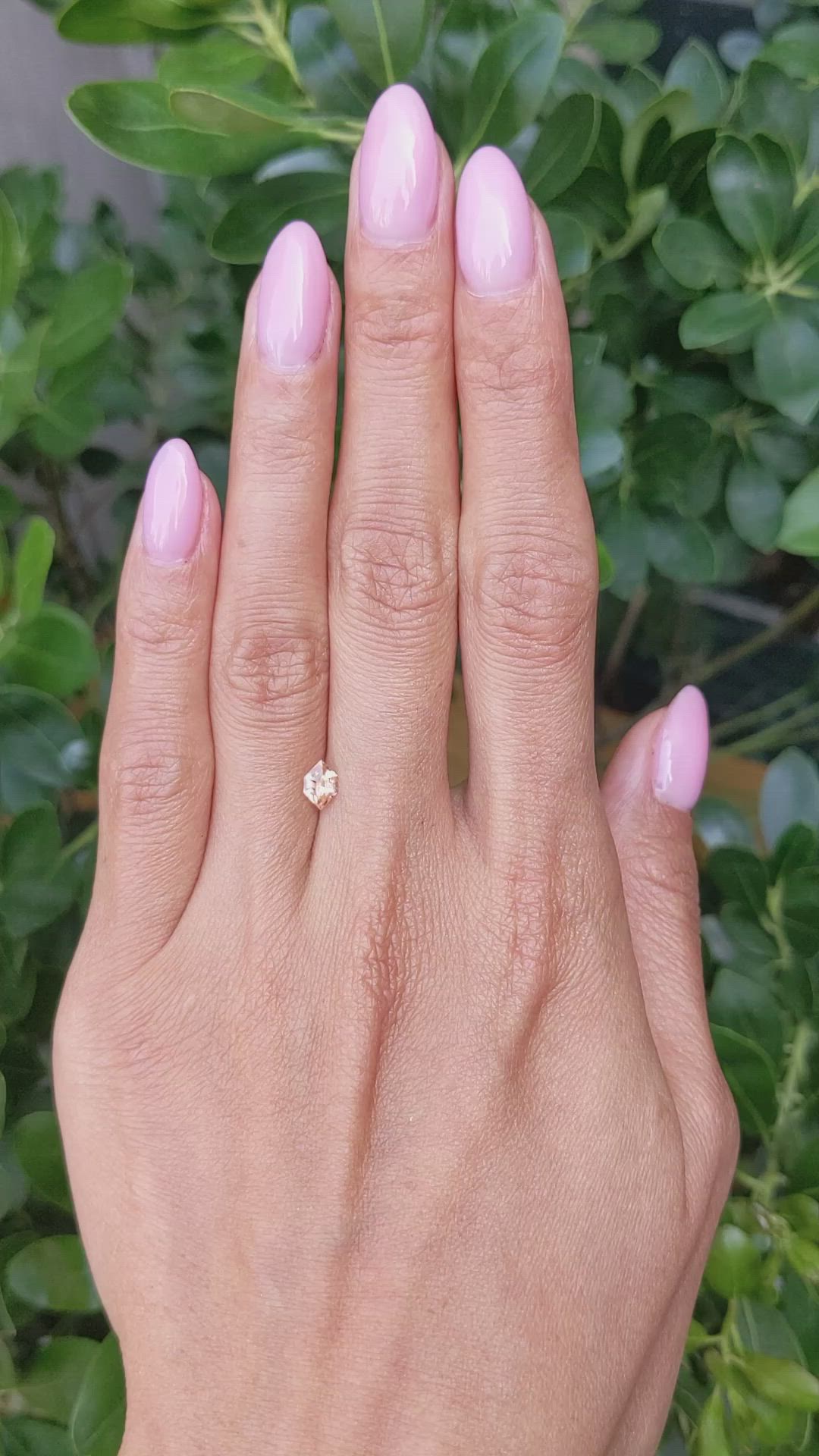 0.54 Ct. Peach Sapphire from Ceylon (Sri Lanka) Size Video