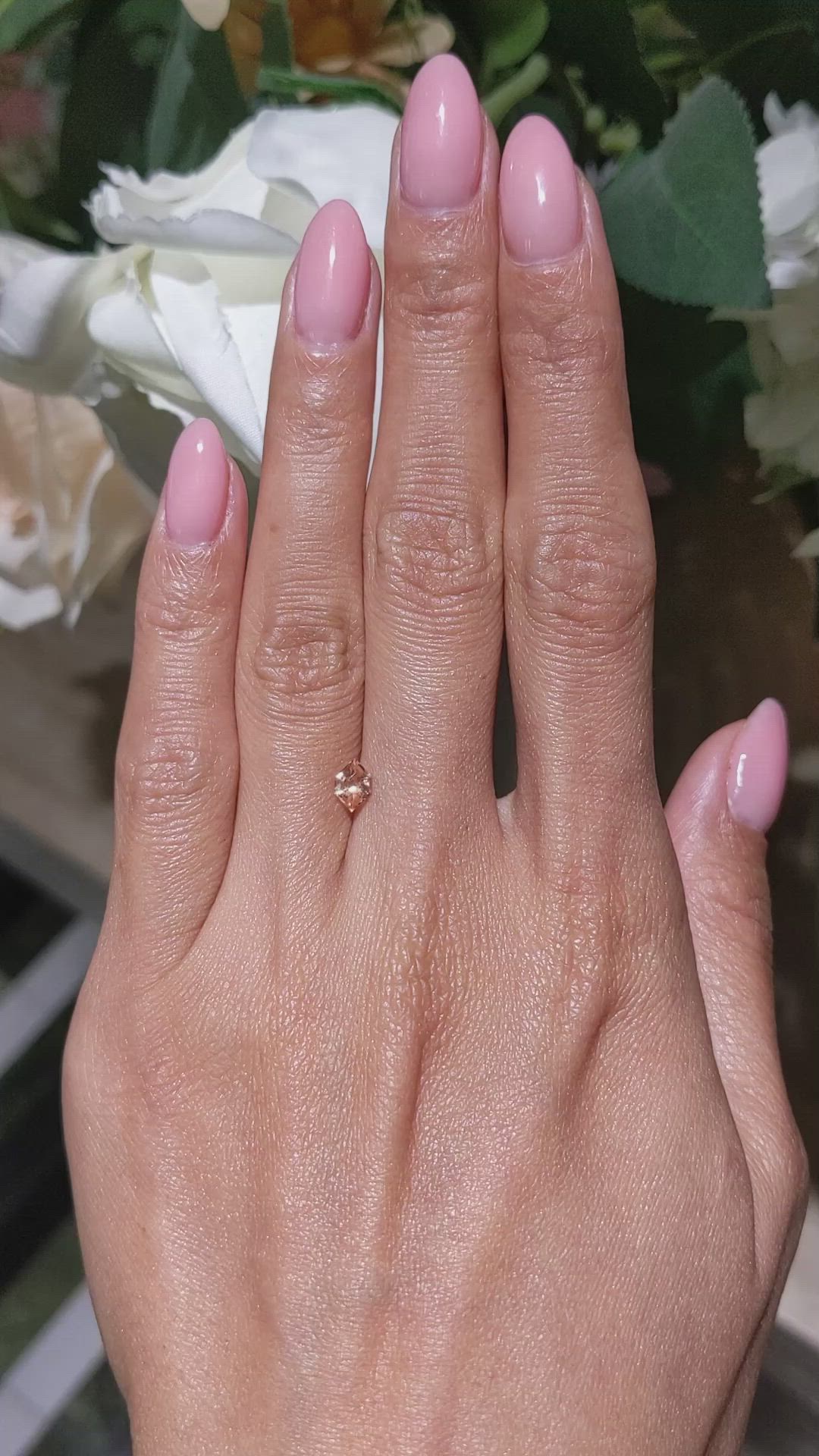 0.54 Ct. Peach Sapphire from Ceylon (Sri Lanka) Size Video