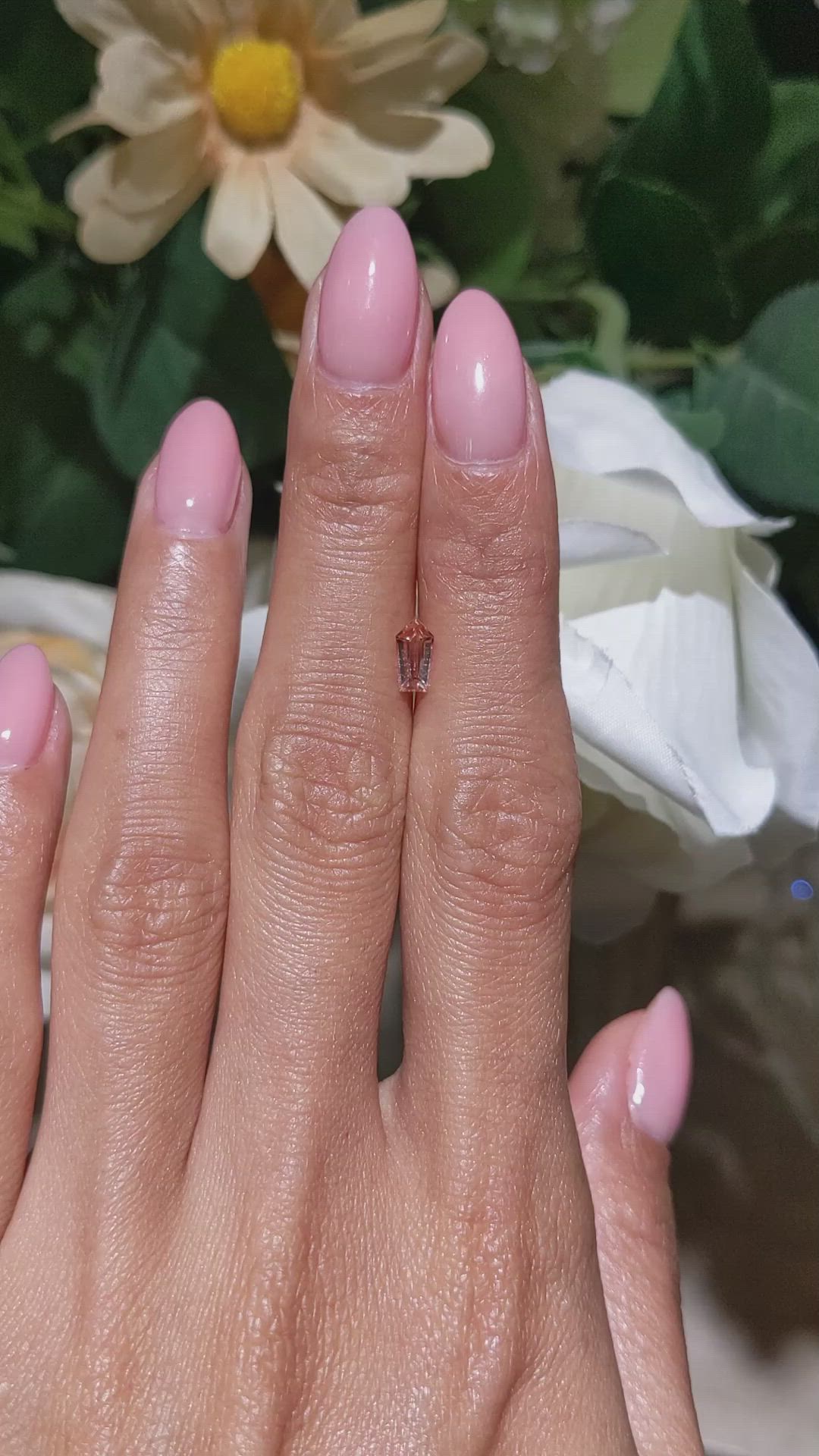 0.55 Ct. Peach Sapphire from Ceylon (Sri Lanka) Size Video