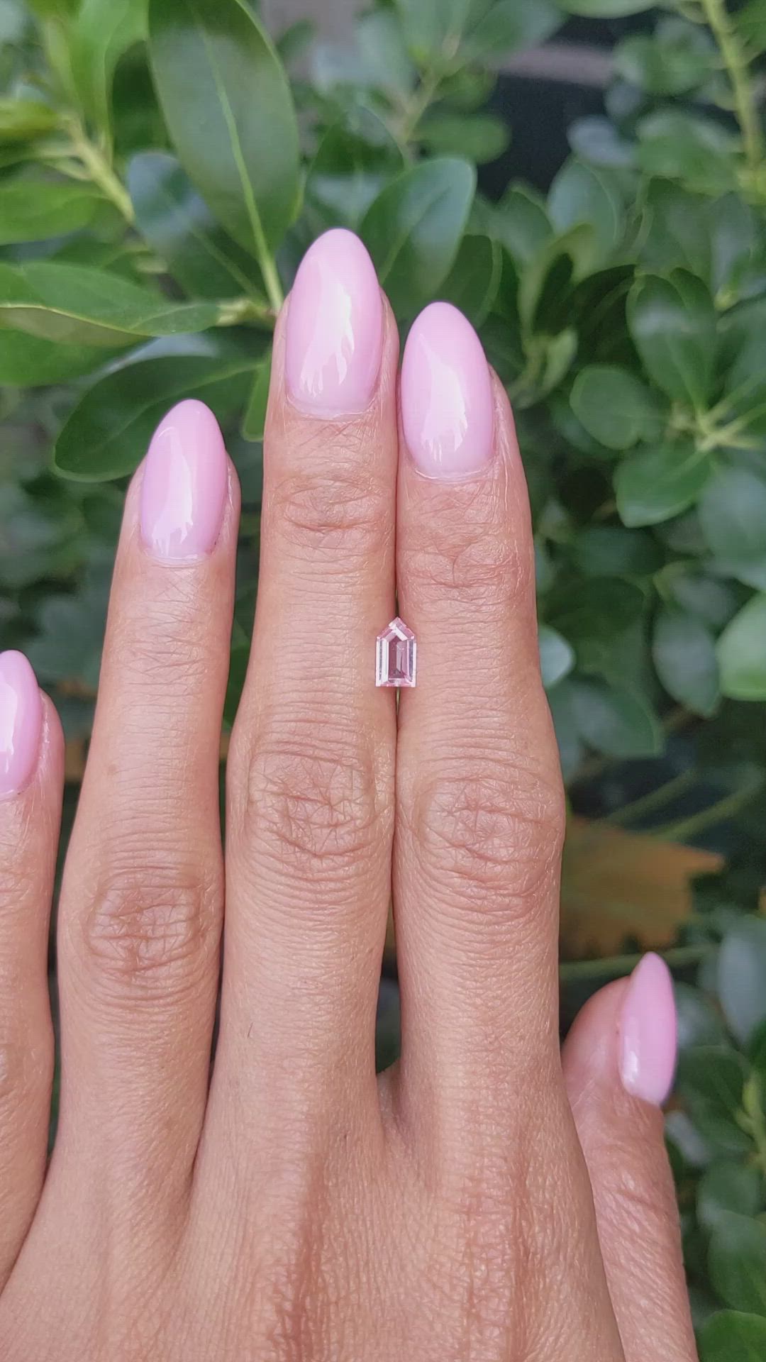 0.58 Ct. Peach Sapphire from Ceylon (Sri Lanka) Size Video
