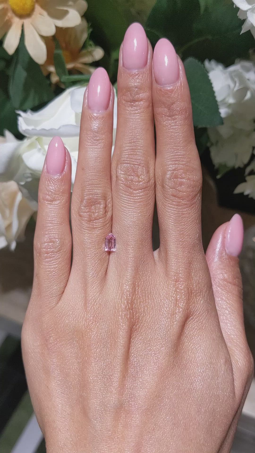 0.58 Ct. Peach Sapphire from Ceylon (Sri Lanka) Size Video