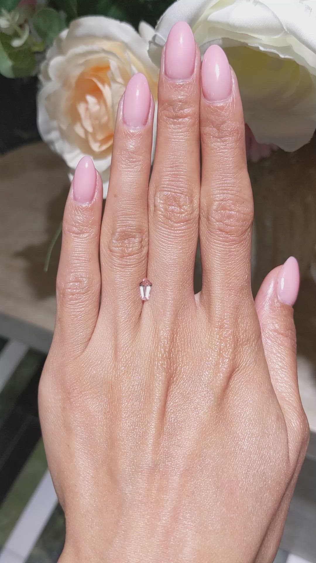 0.59 Ct. Peach Sapphire from Ceylon (Sri Lanka) Size Video
