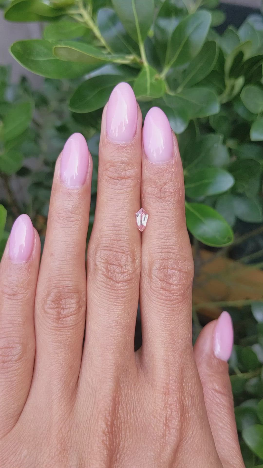 0.60 Ct. Peach Sapphire from Ceylon (Sri Lanka) Size Video