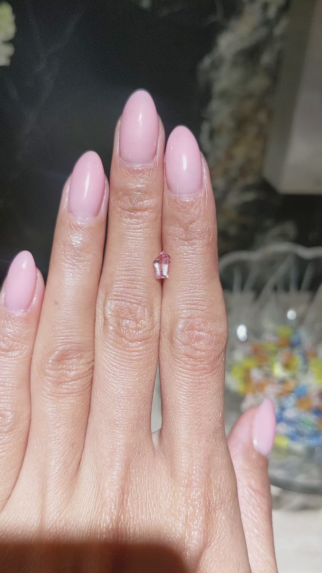 0.61 Ct. Peach Sapphire from Ceylon (Sri Lanka) Size Video