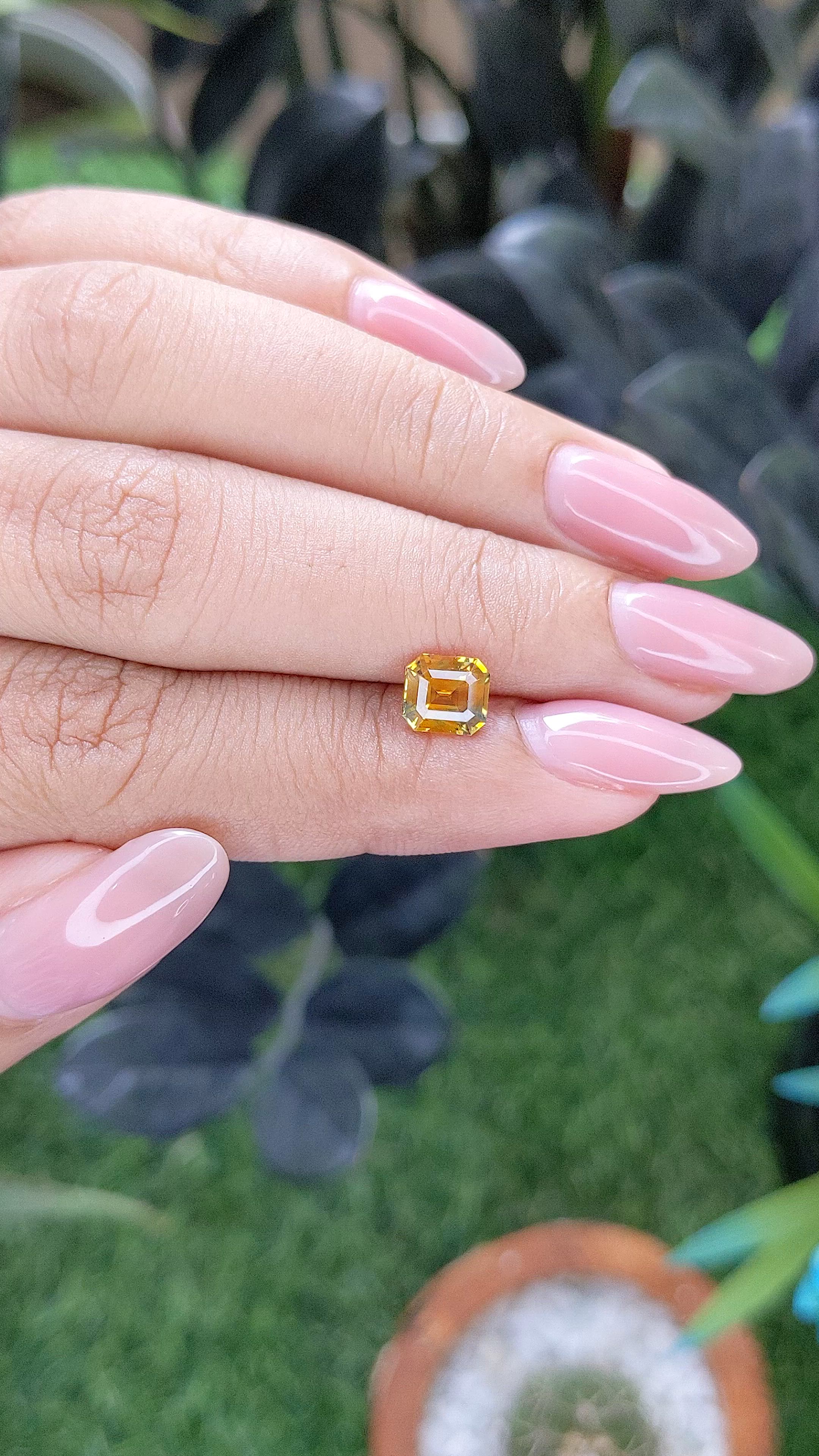 1.30 Ct. Orangish Yellow Sapphire from Madagascar Size Video