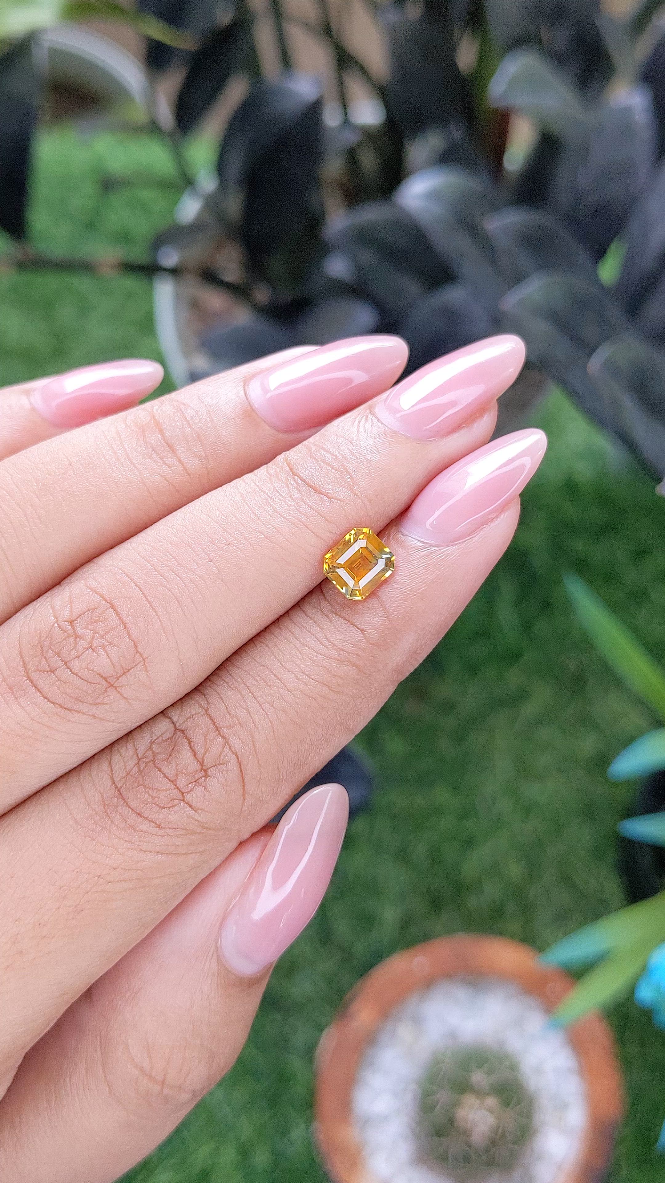 1.30 Ct. Orangish Yellow Sapphire from Madagascar Size Video