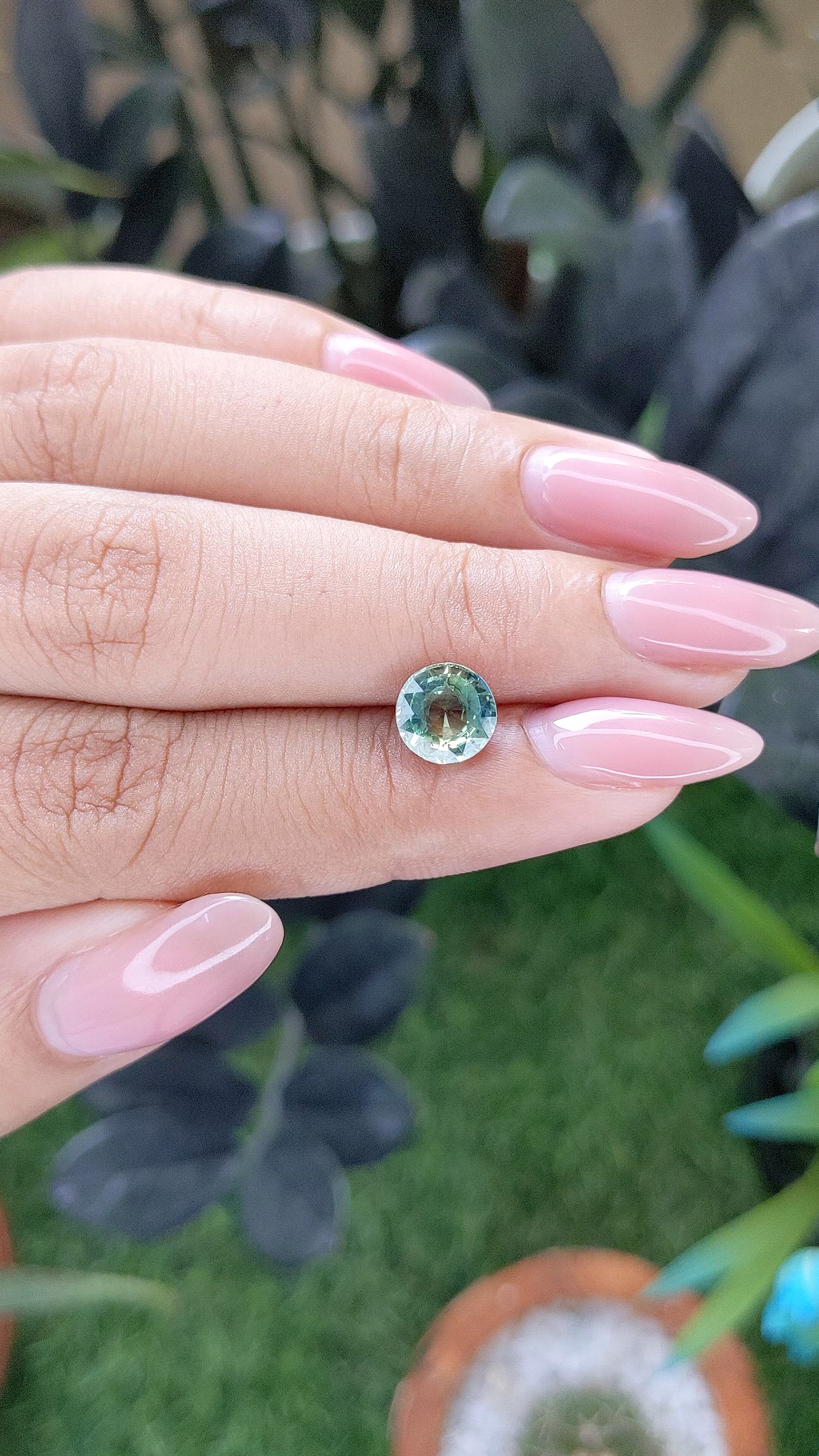 2.01 Ct. Bluish Green Sapphire from Madagascar Size Video
