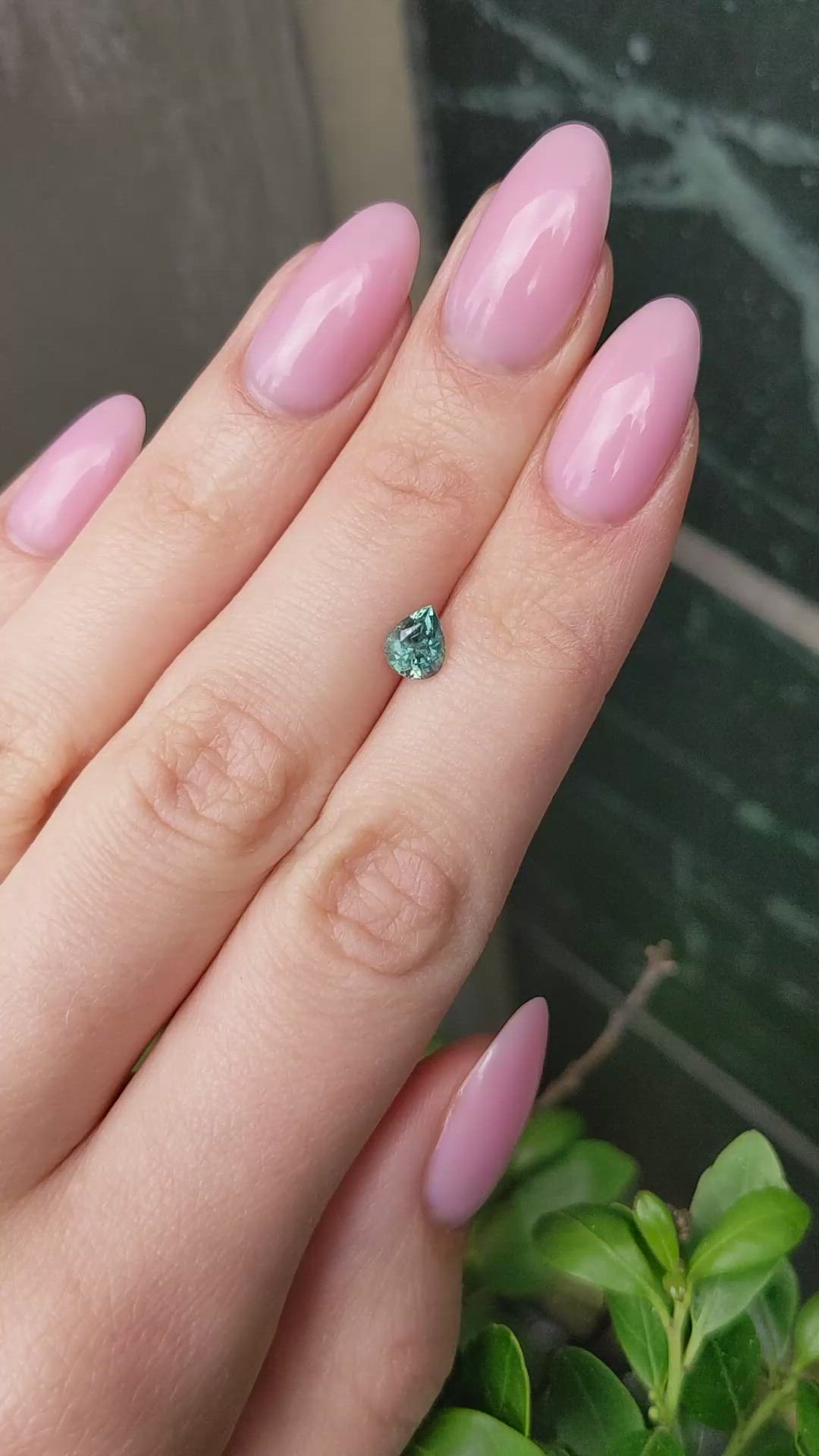 0.98 Ct. Bluish Green Sapphire from Montana Size Video