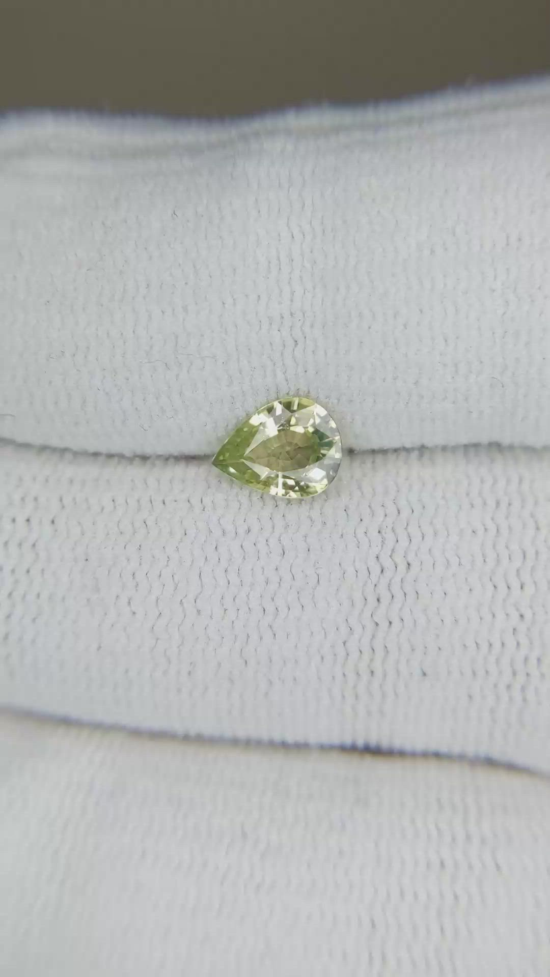0.88 Ct. Yellowish Green Sapphire from Ceylon (Sri Lanka) Size Video