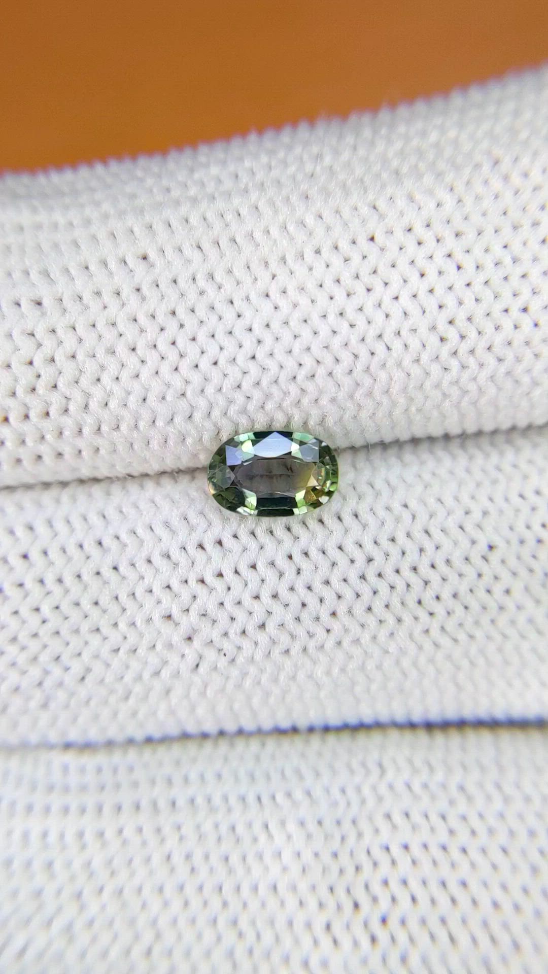 0.76 Ct. Yellowish Green Sapphire from Ceylon (Sri Lanka) Size Video