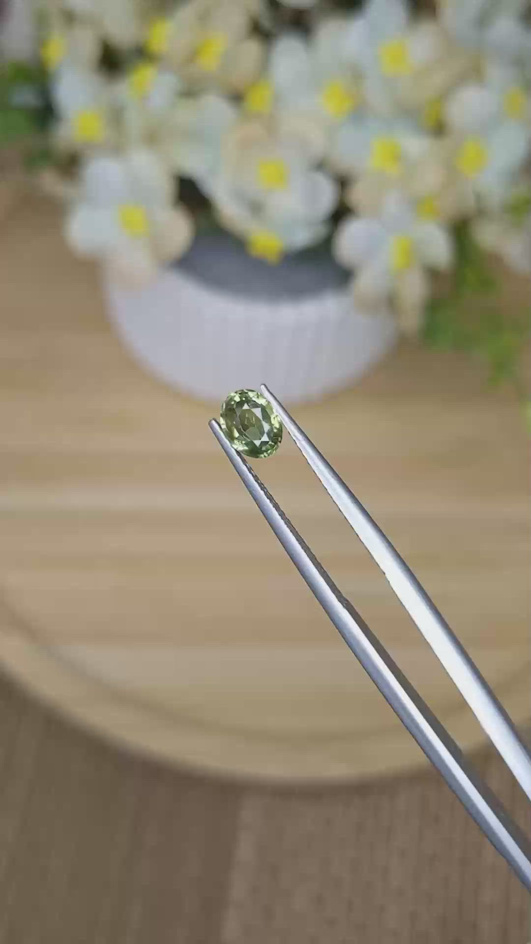 0.77 Ct. Yellowish Green Sapphire from Ceylon (Sri Lanka) Size Video