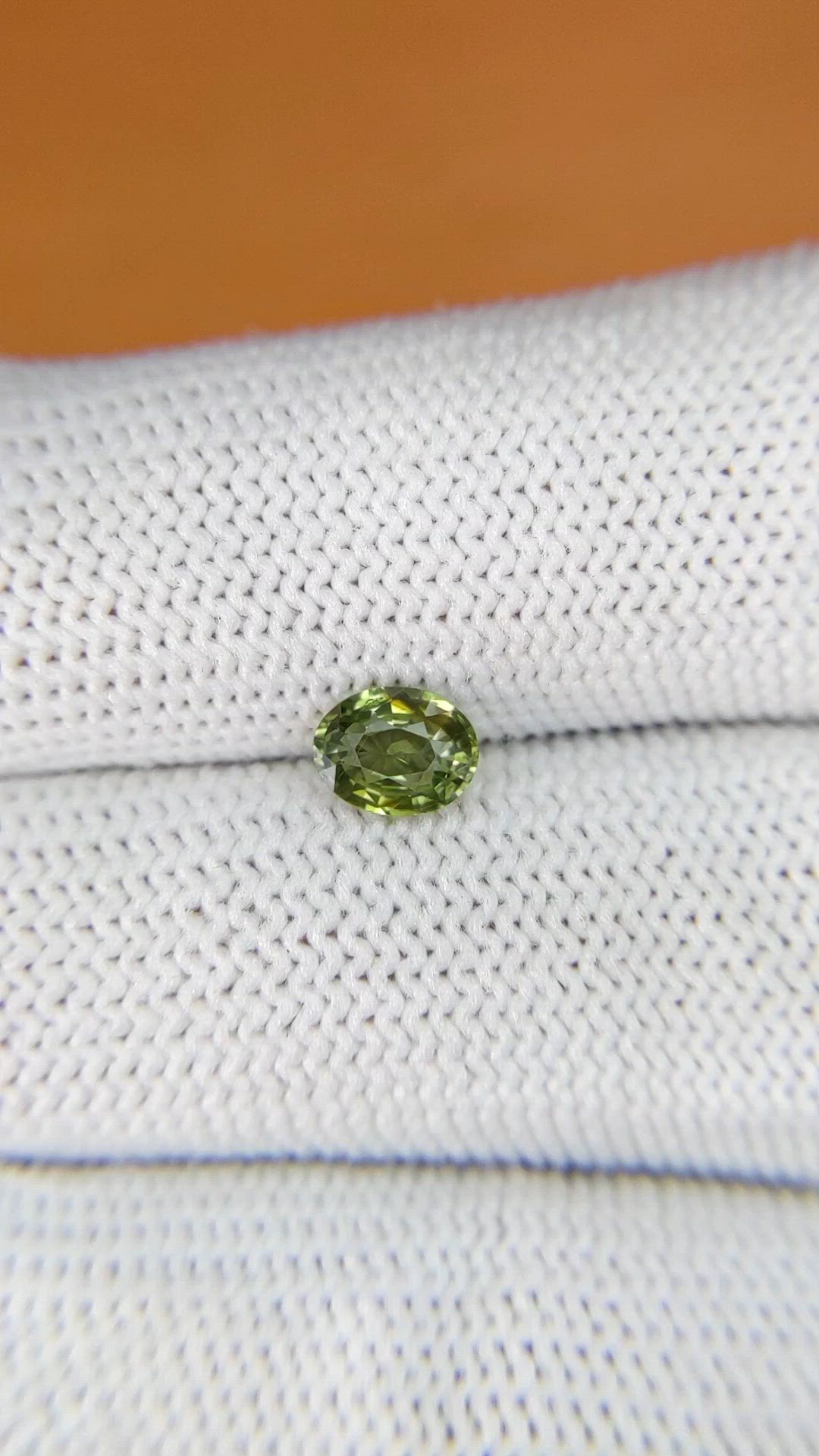 0.77 Ct. Yellowish Green Sapphire from Ceylon (Sri Lanka) Size Video