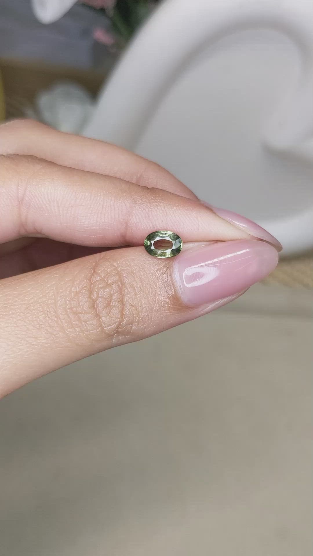 0.90 Ct. Yellowish Green Sapphire from Ceylon (Sri Lanka) Size Video