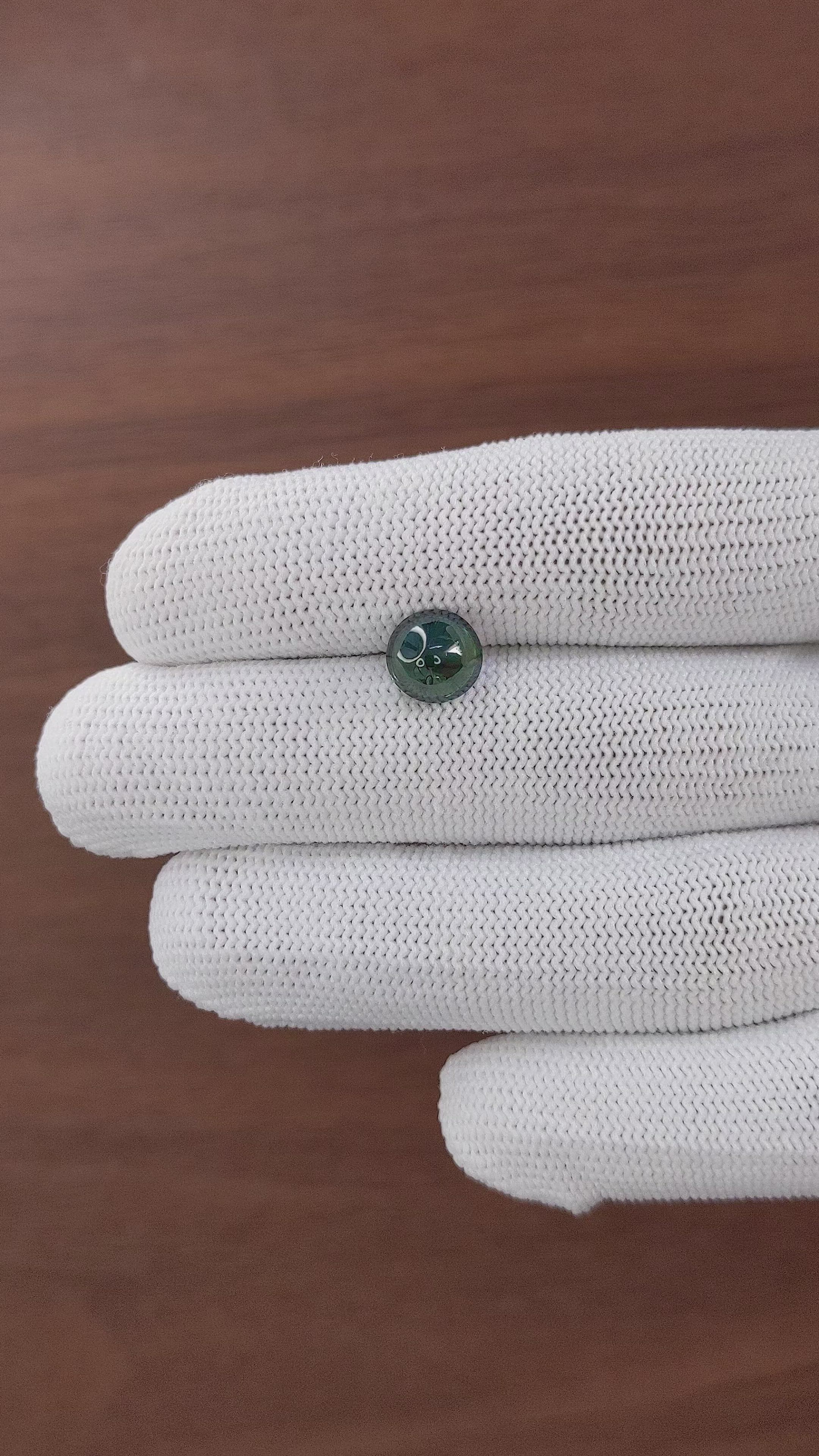 3.56 Ct. Bluish Green Cabochon Sapphire from Madagascar Size Video