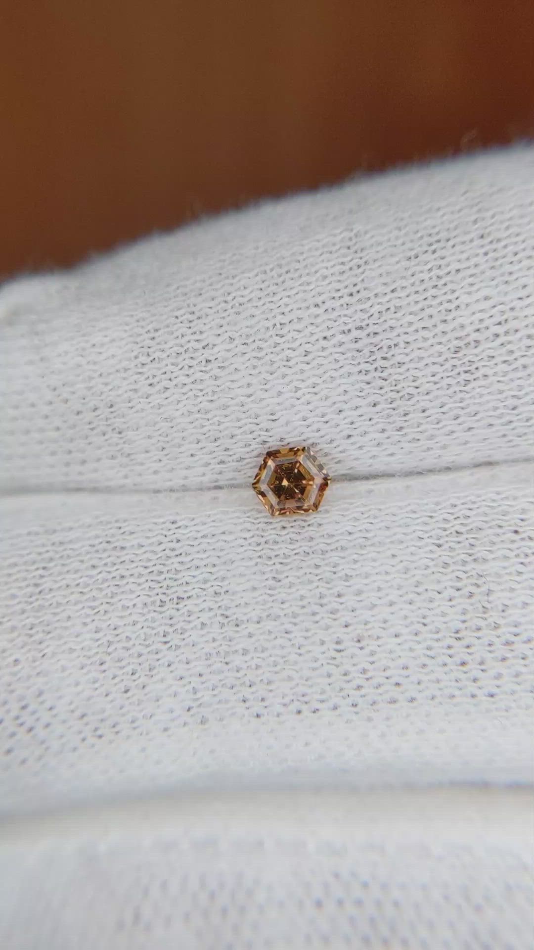 0.34 Ct. Orangish Brown Sapphire from Ceylon (Sri Lanka) Size Video