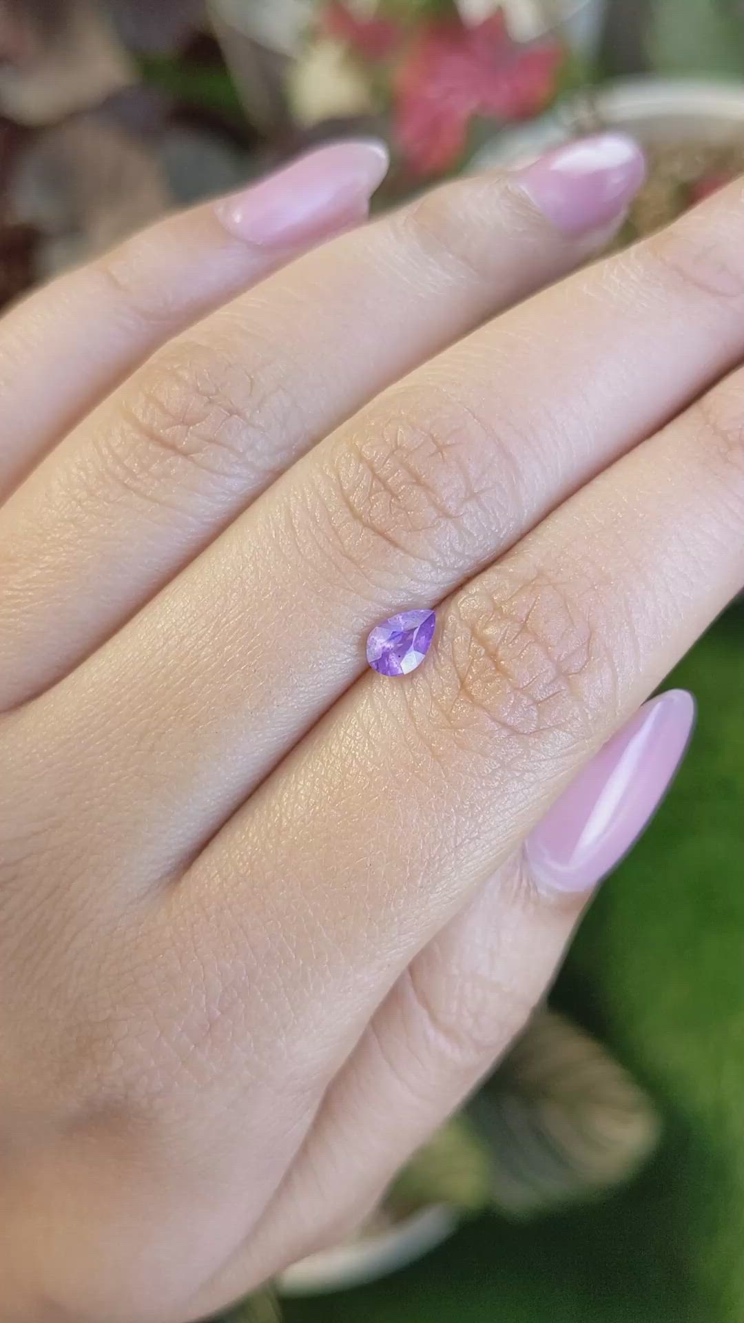 0.61 Ct. Pinkish Purple Sapphire from Ceylon (Sri Lanka) Size Video