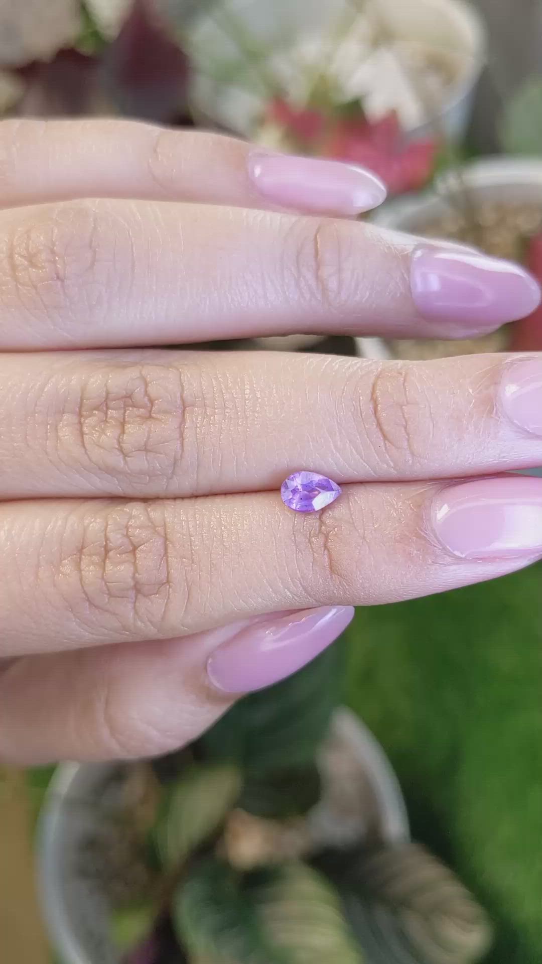 0.61 Ct. Pinkish Purple Sapphire from Ceylon (Sri Lanka) Size Video