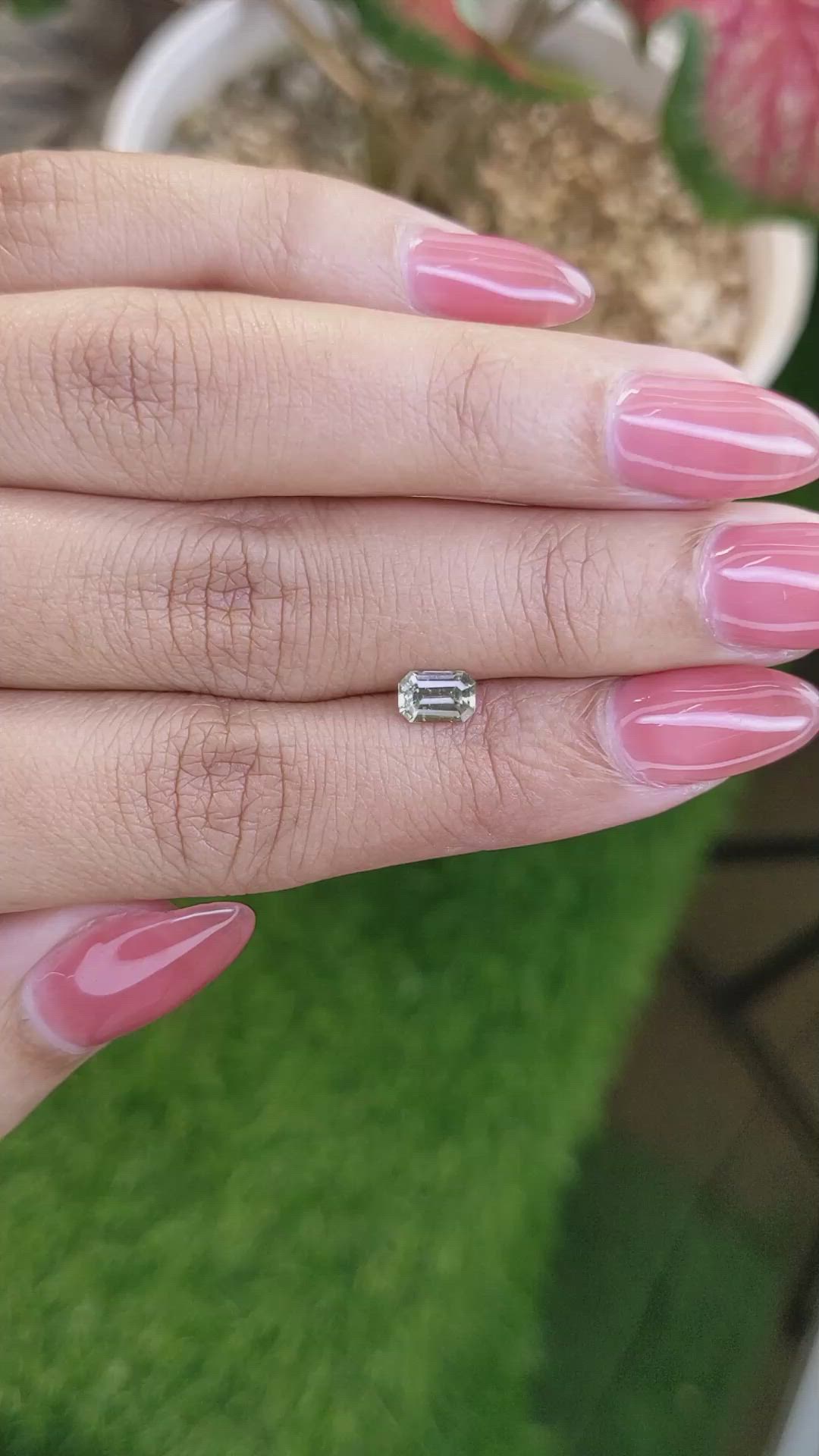 0.69 Ct. Yellowish Green Sapphire from Ceylon (Sri Lanka) Size Video