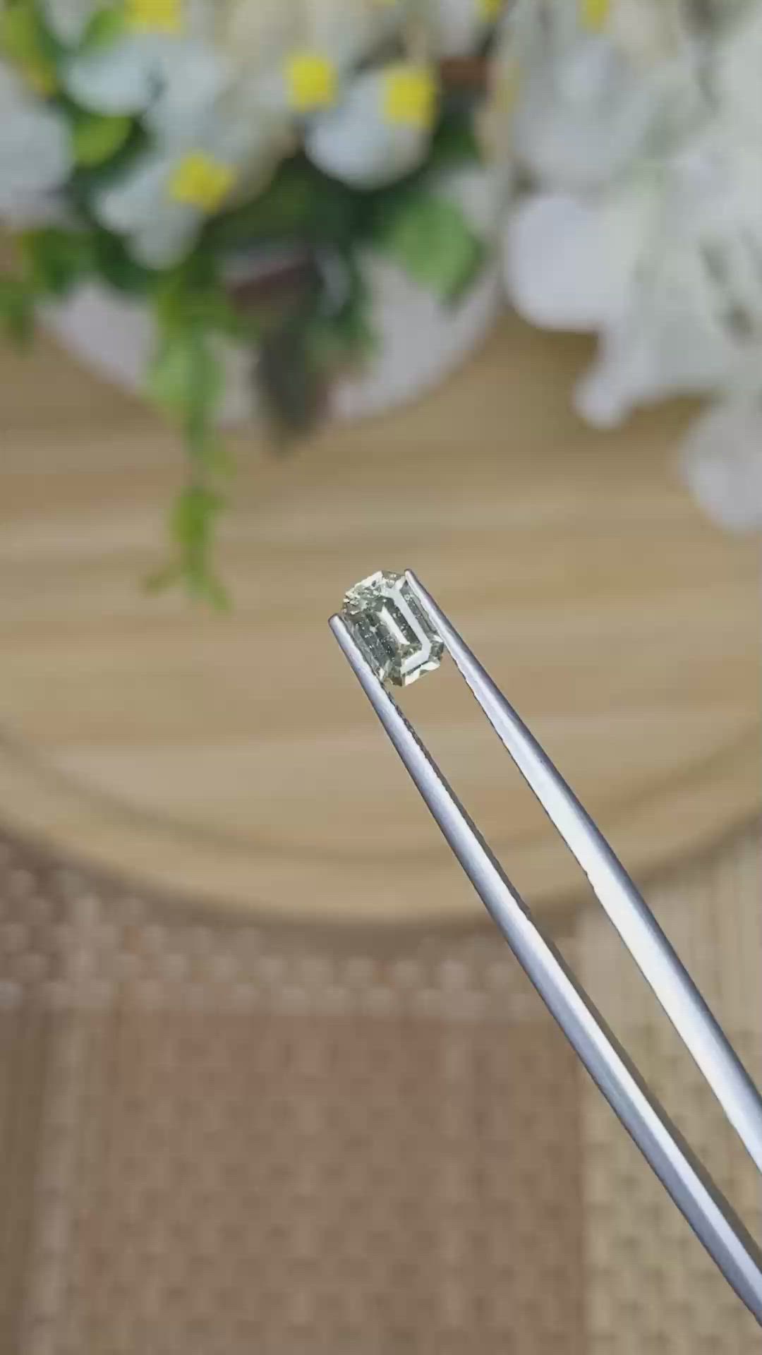 0.69 Ct. Yellowish Green Sapphire from Ceylon (Sri Lanka) Size Video