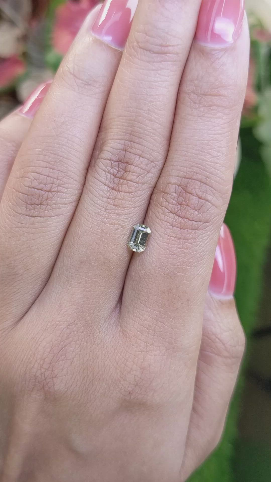 0.69 Ct. Yellowish Green Sapphire from Ceylon (Sri Lanka) Size Video