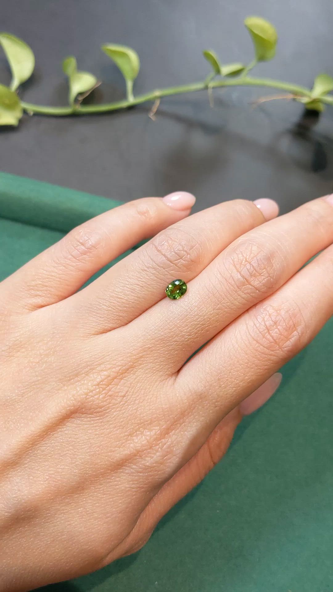 0.61 Ct. Yellowish Green Sapphire from Thailand Size Video