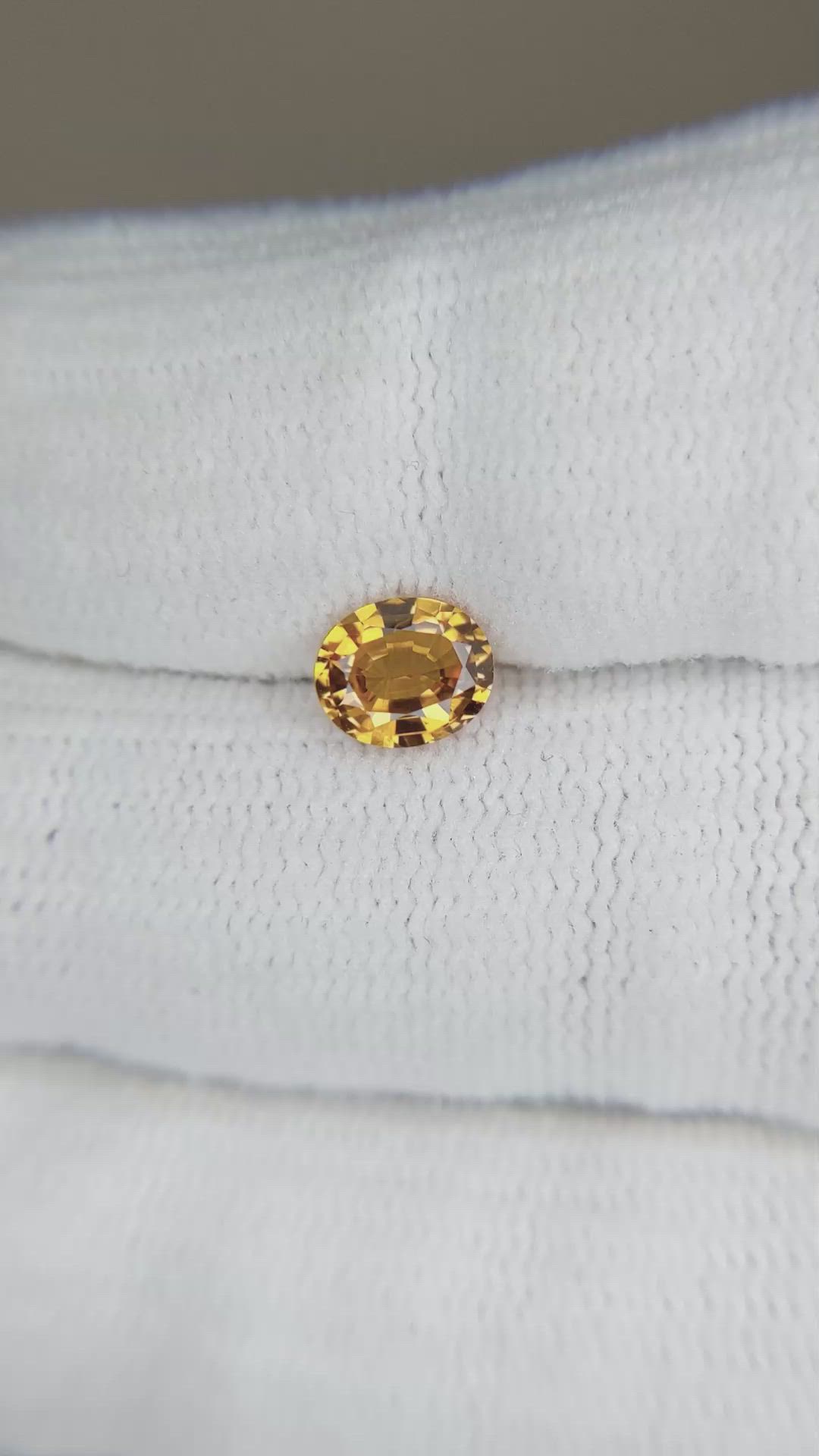 0.97 Ct. Orangish Yellow Sapphire from Thailand Size Video