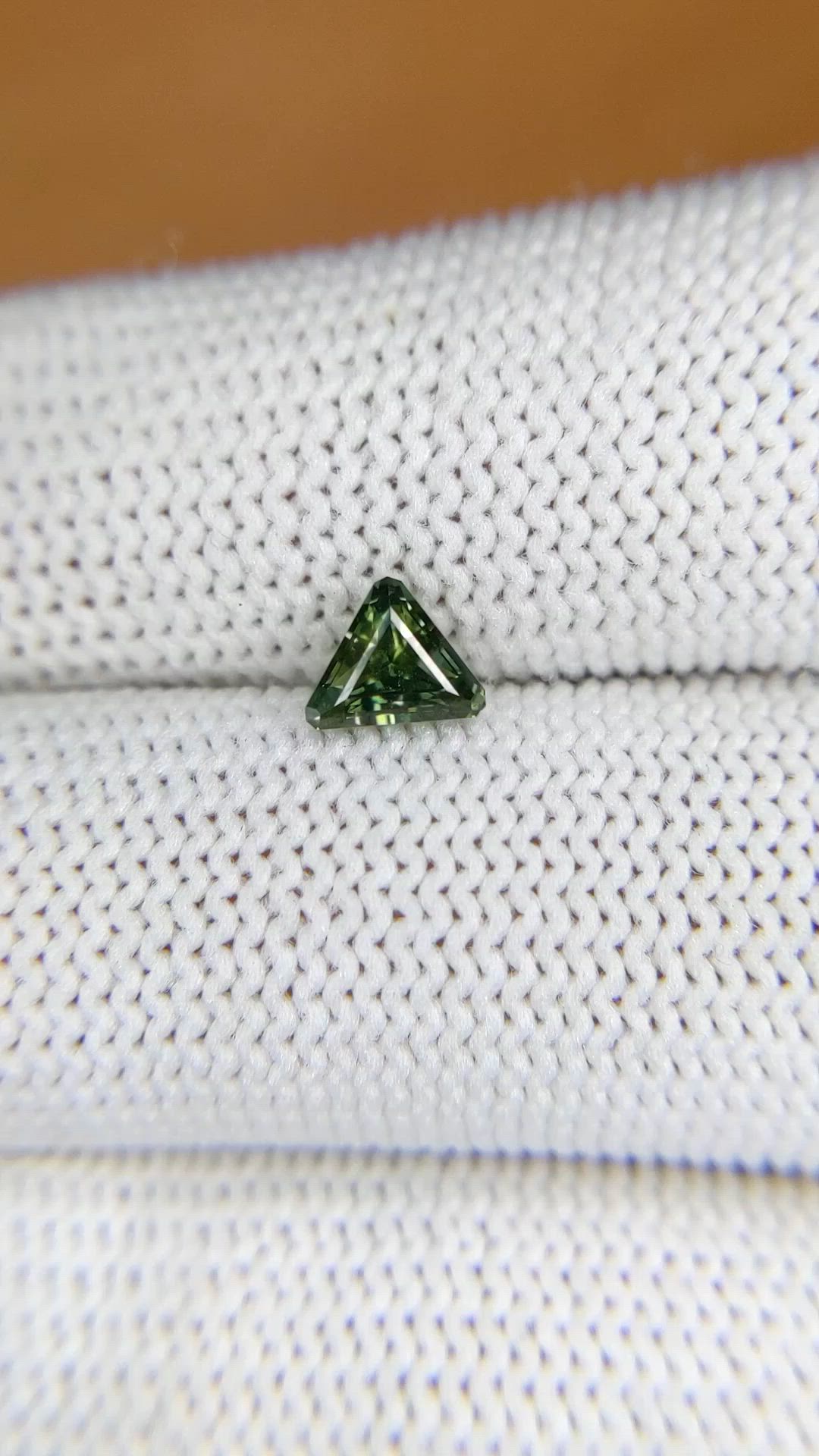 0.69 Ct. Yellowish Green Sapphire from Ceylon (Sri Lanka) Size Video